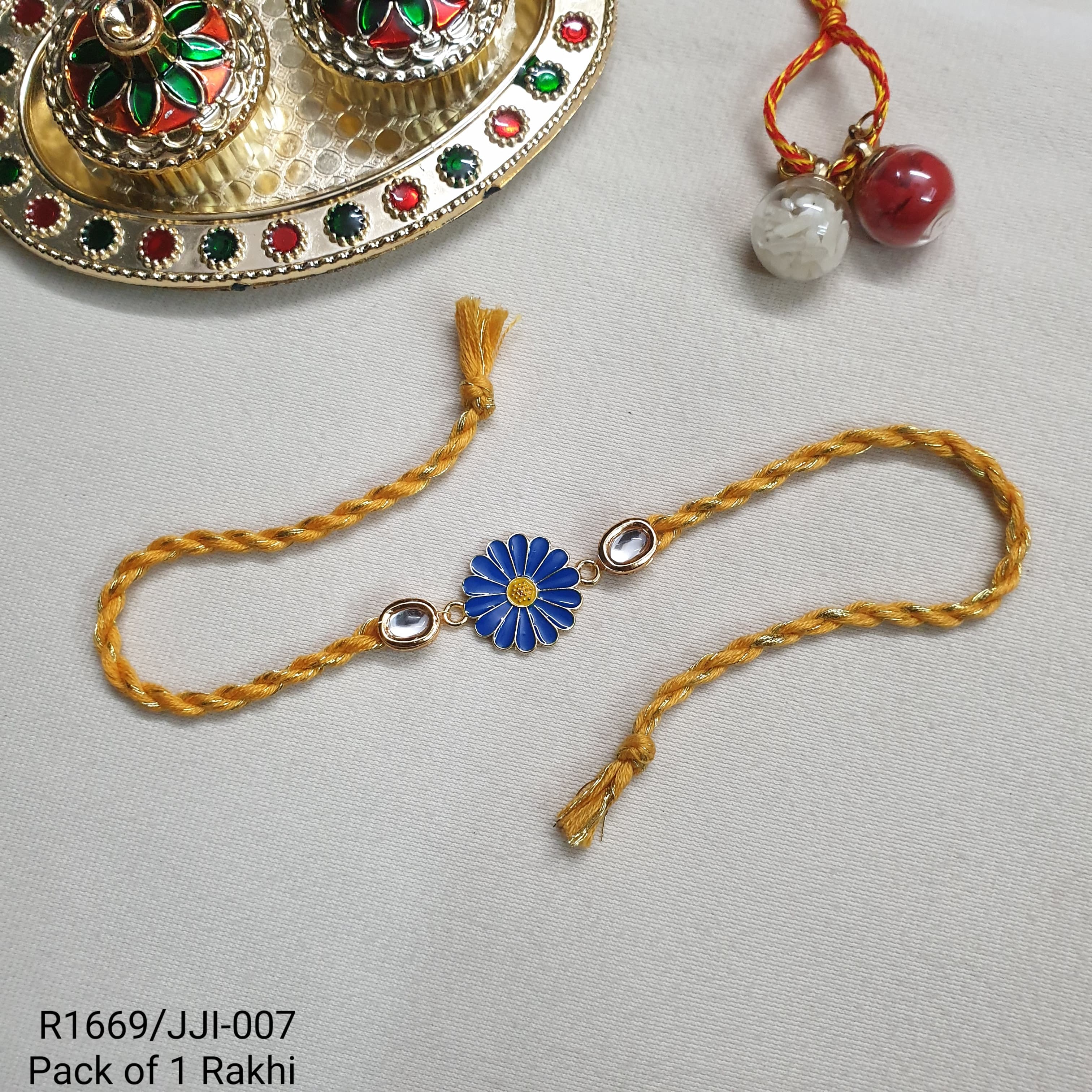 Dark Blue Floral Enamel Rakhi