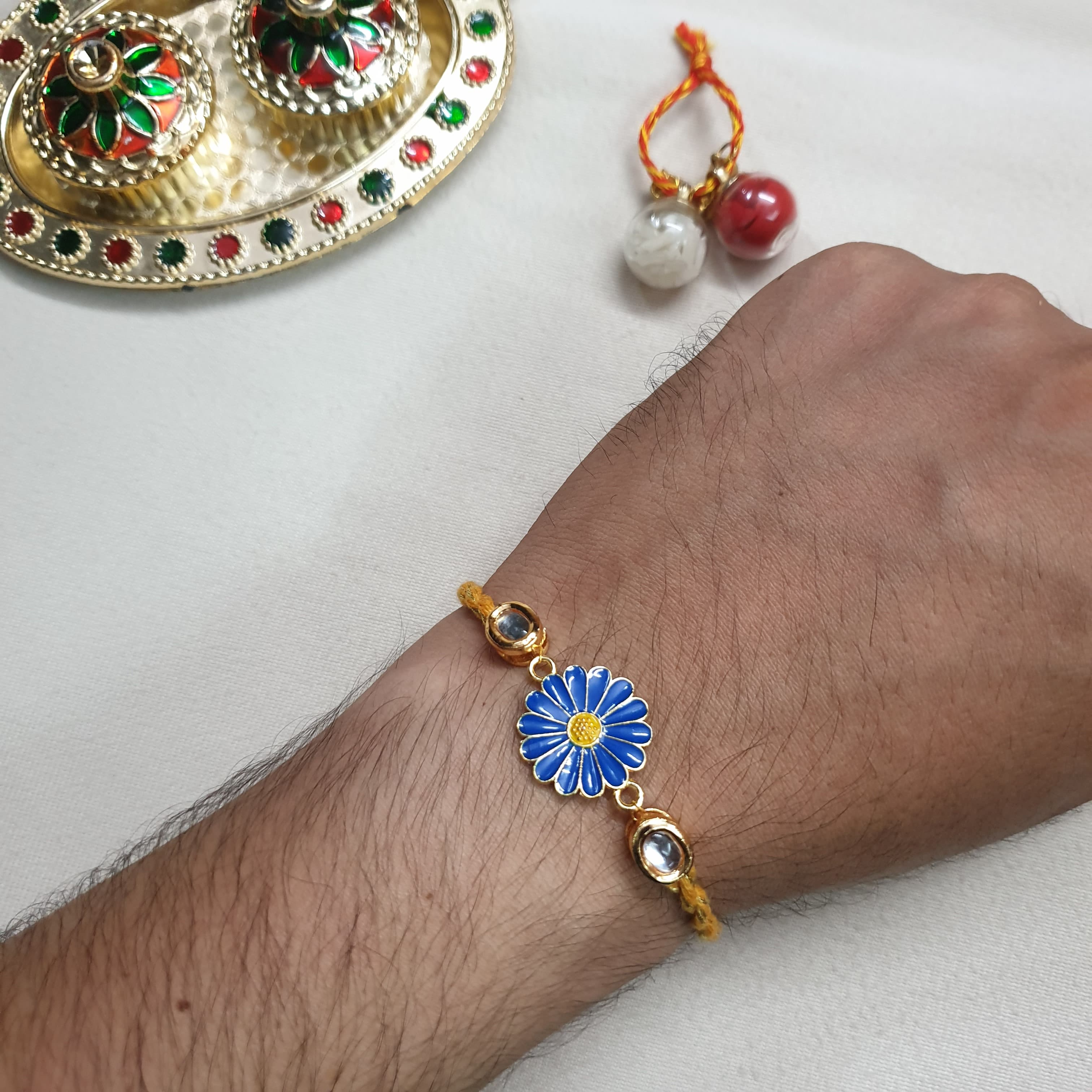 Dark Blue Floral Enamel Rakhi