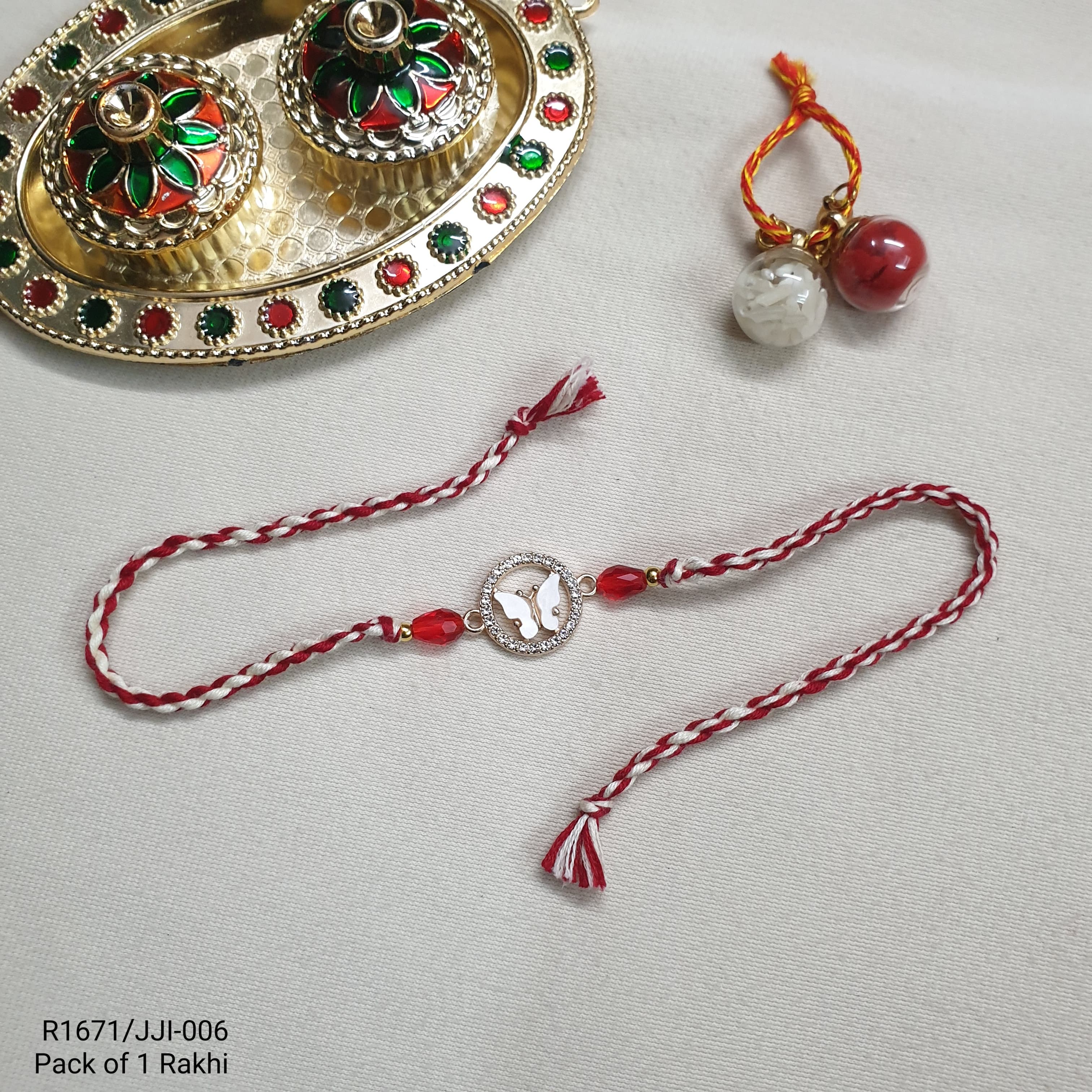 White Enamel Butterfly Rakhi