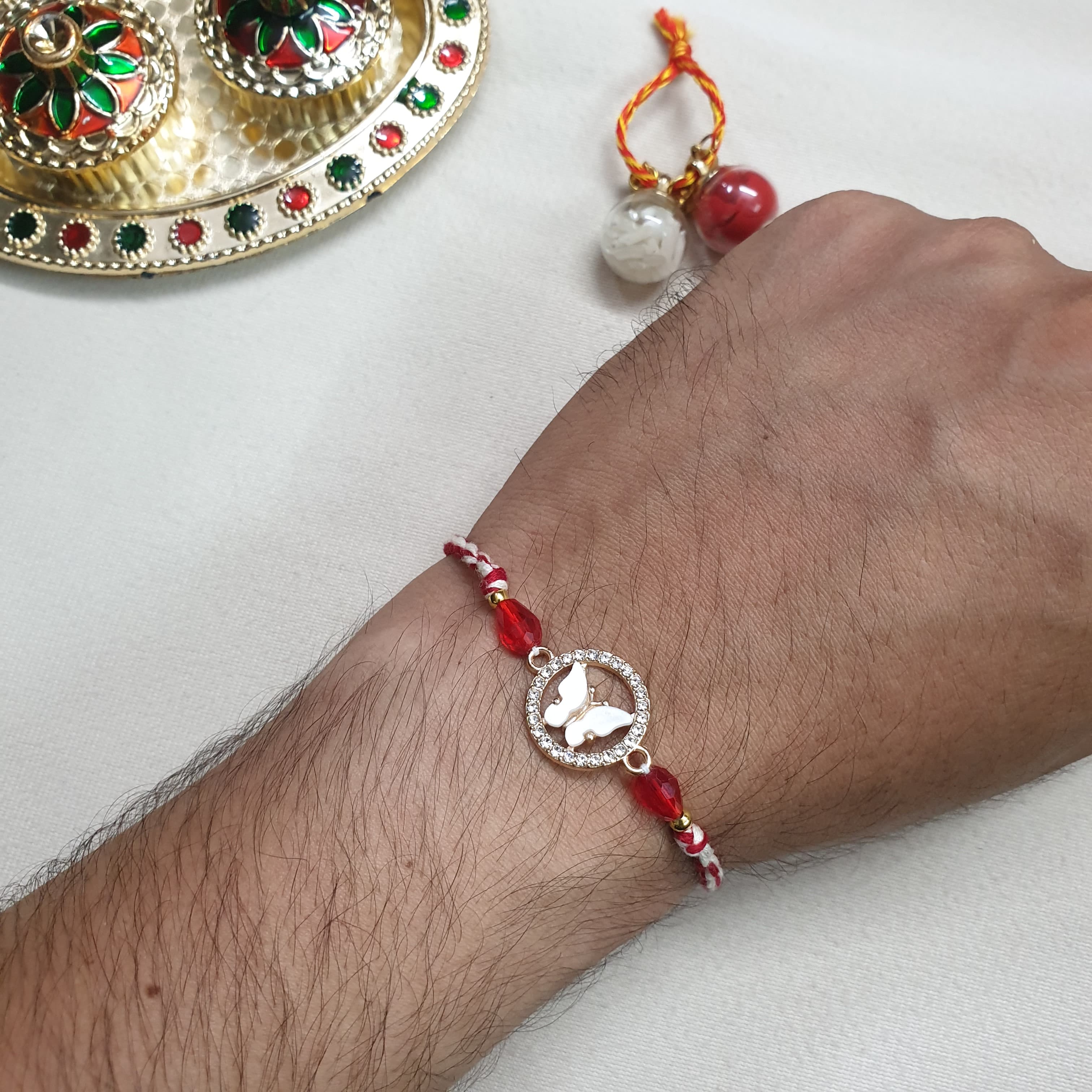 White Enamel Butterfly Rakhi