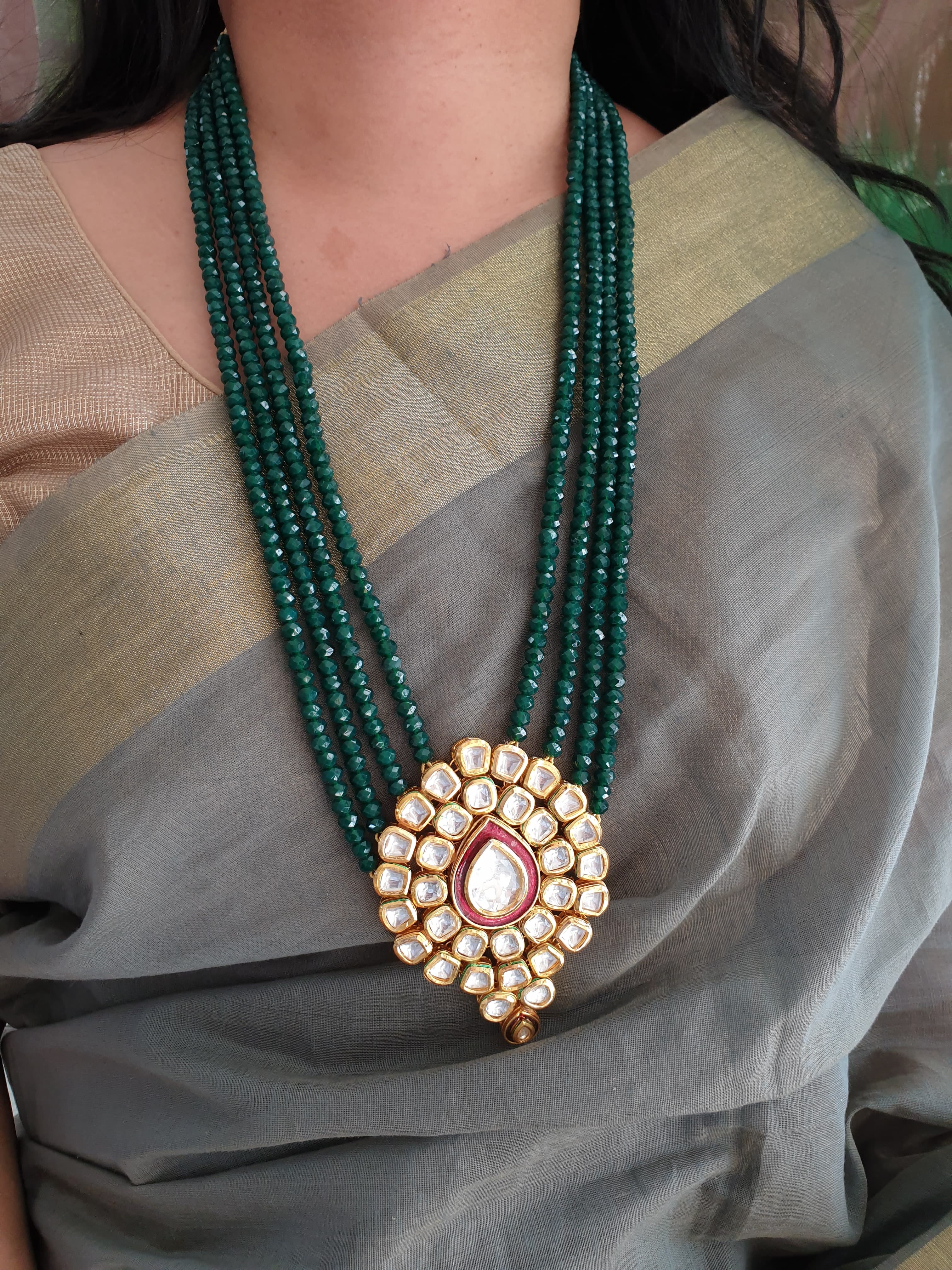 Gold Tone Kundan Emerald Green Beaded Pendant Set