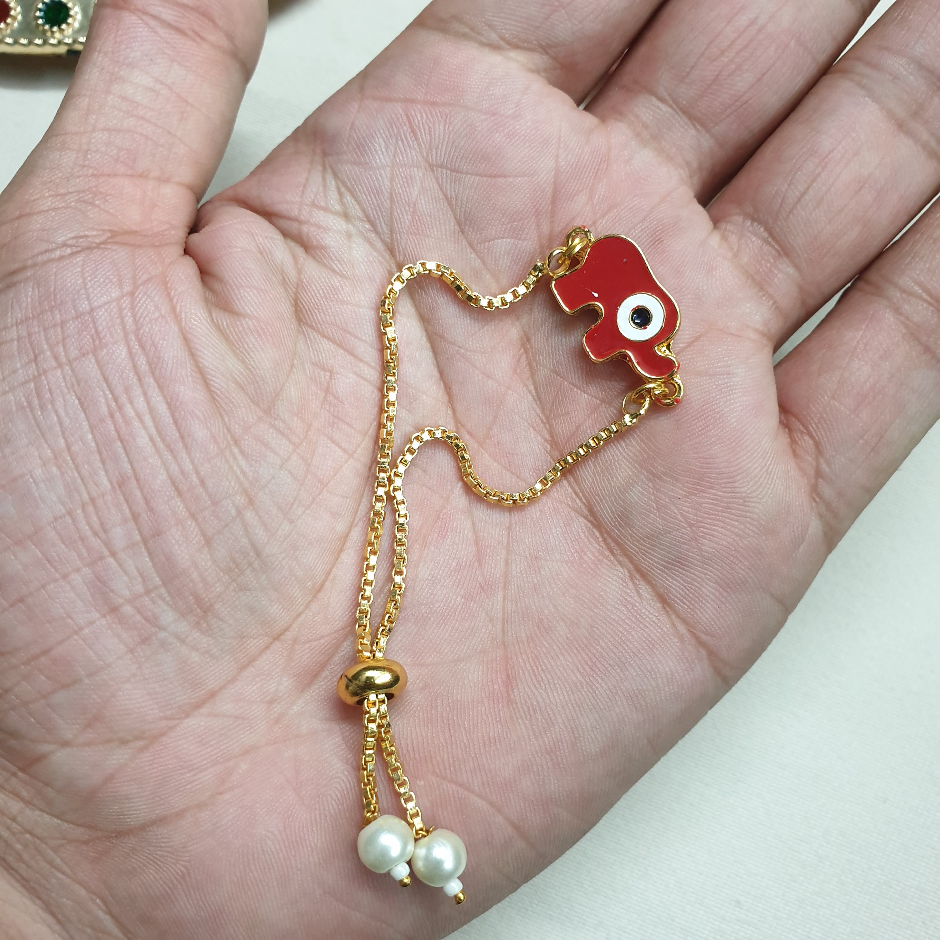 Red Elephant Evil Eye Rakhi Bracelet