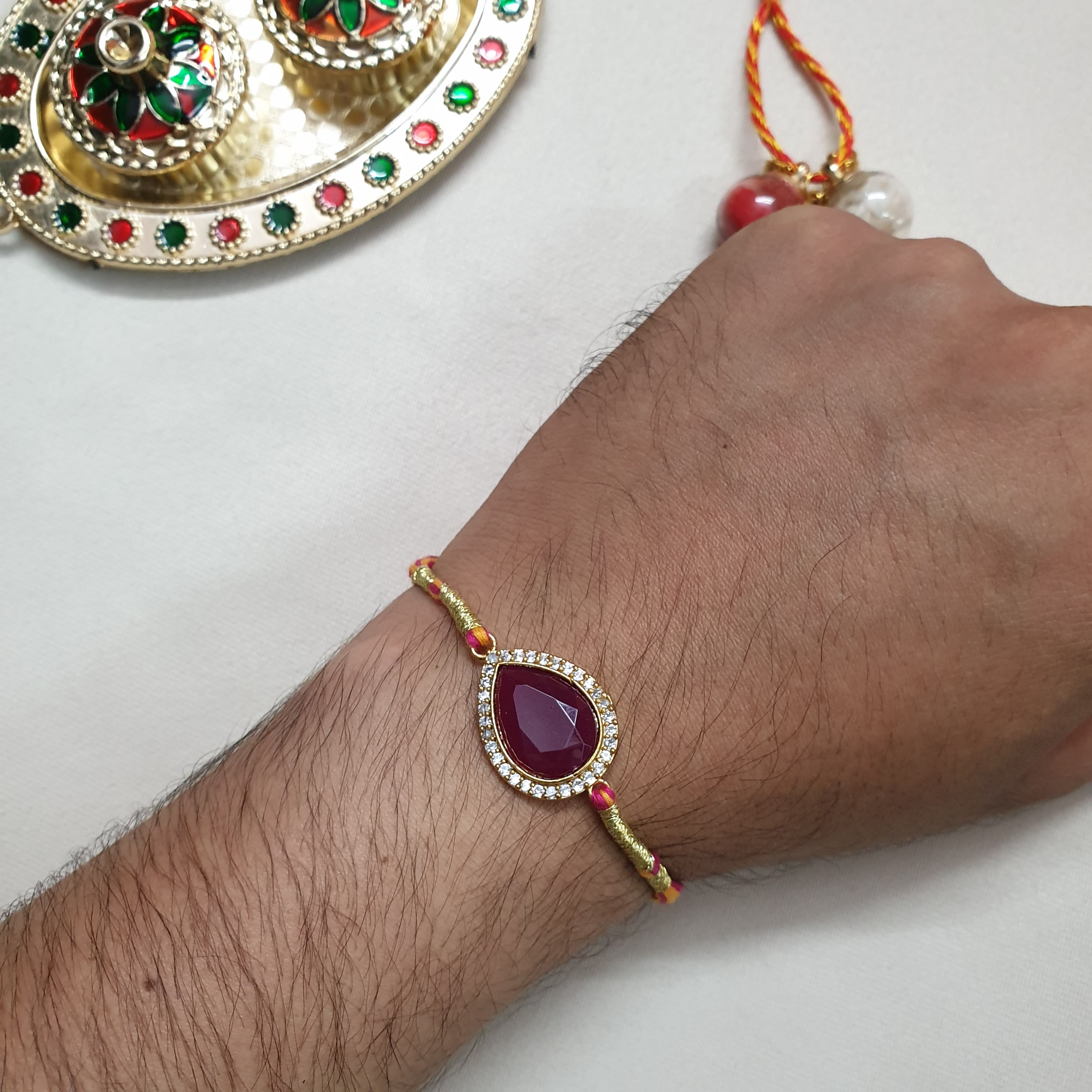 AD Red Drop Stone Rakhi