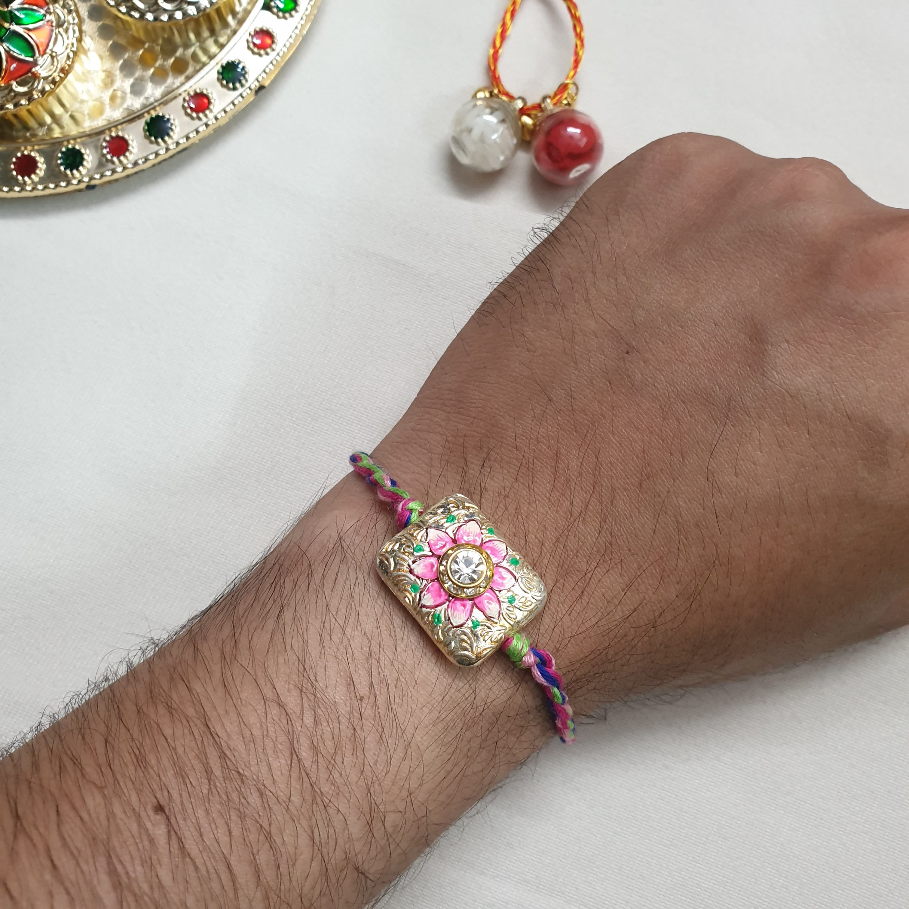 Floral Hanpainted Stone Rakhi