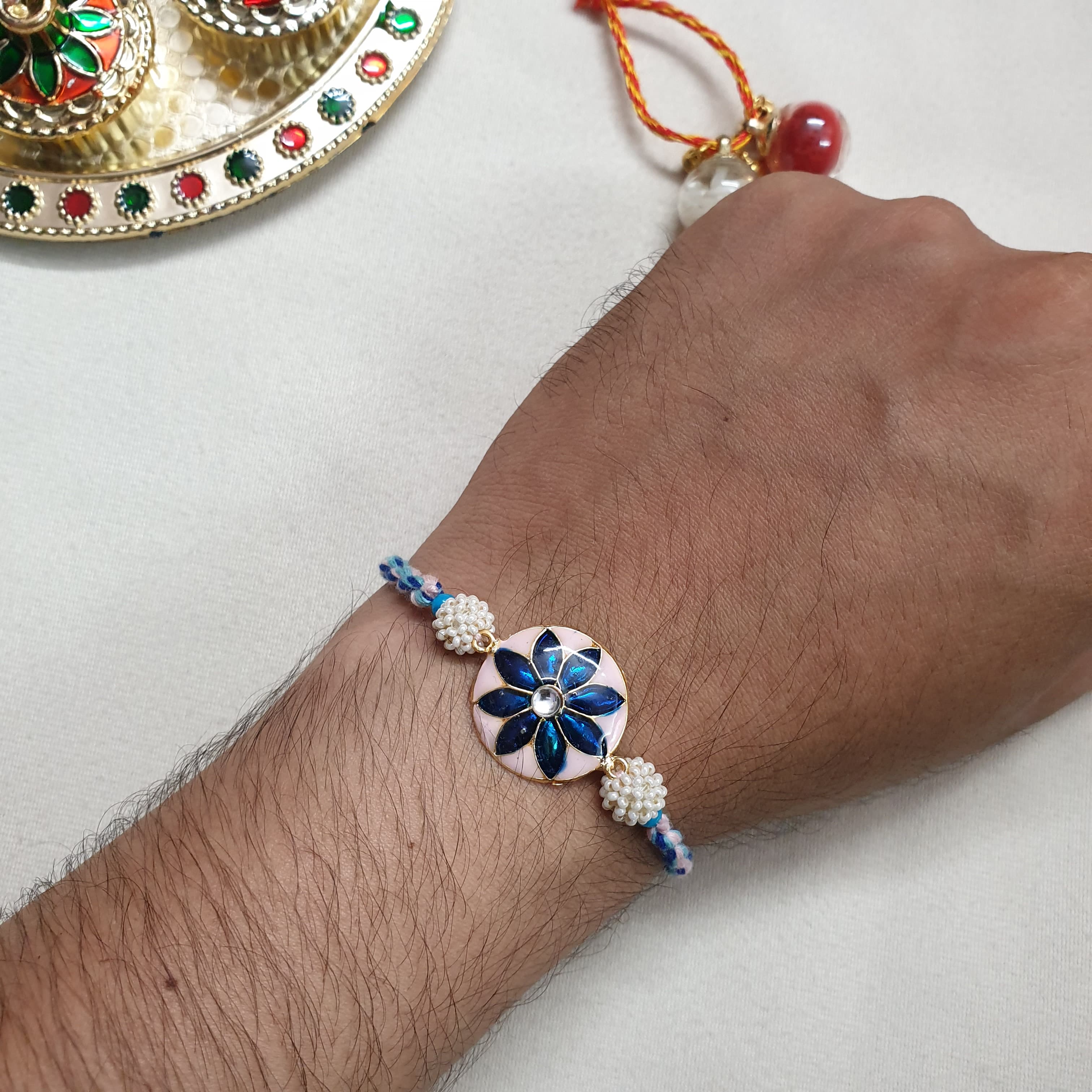 Dark Blue Flower Enamel Rakhi