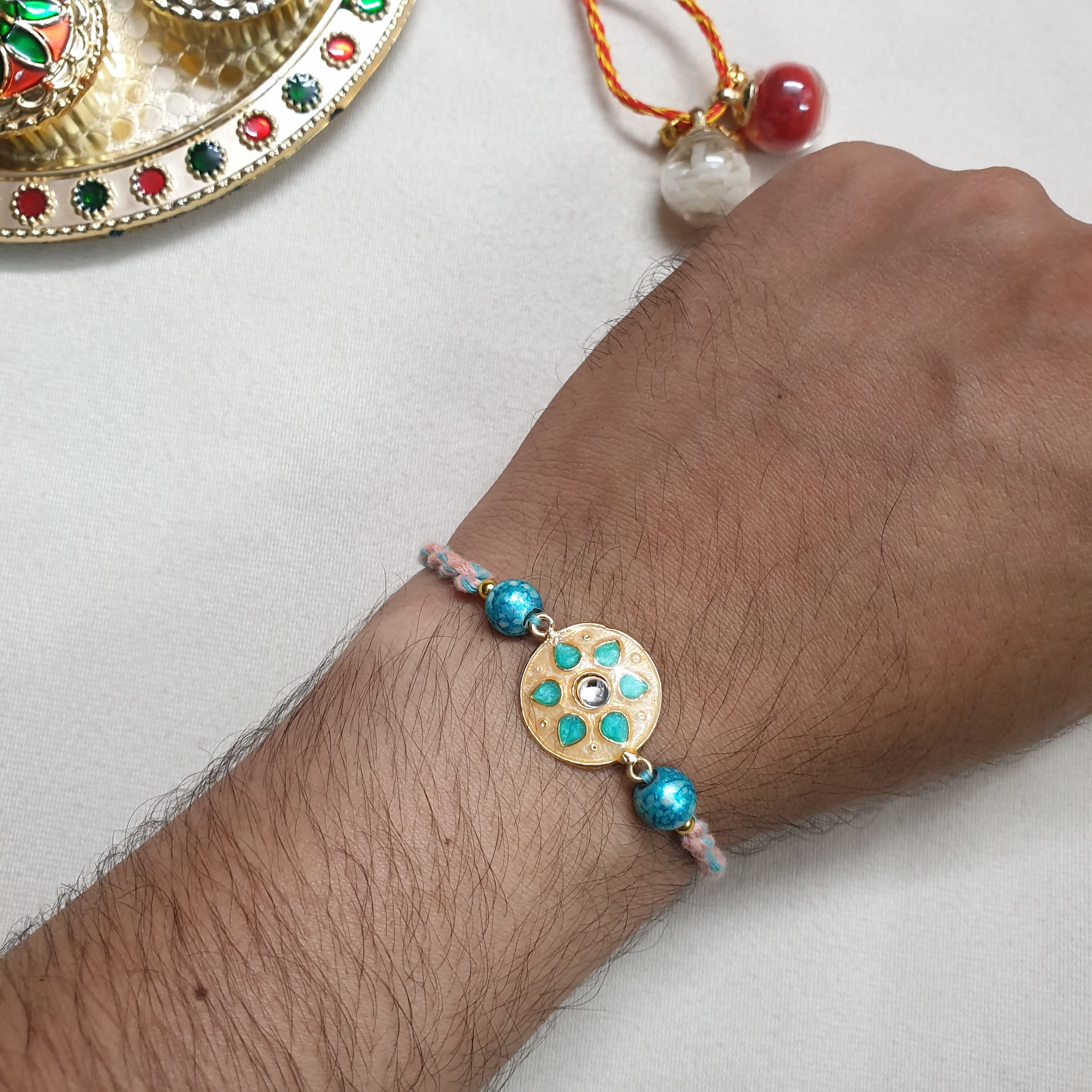 Light Peach Floral Kundan Enamel Rakhi