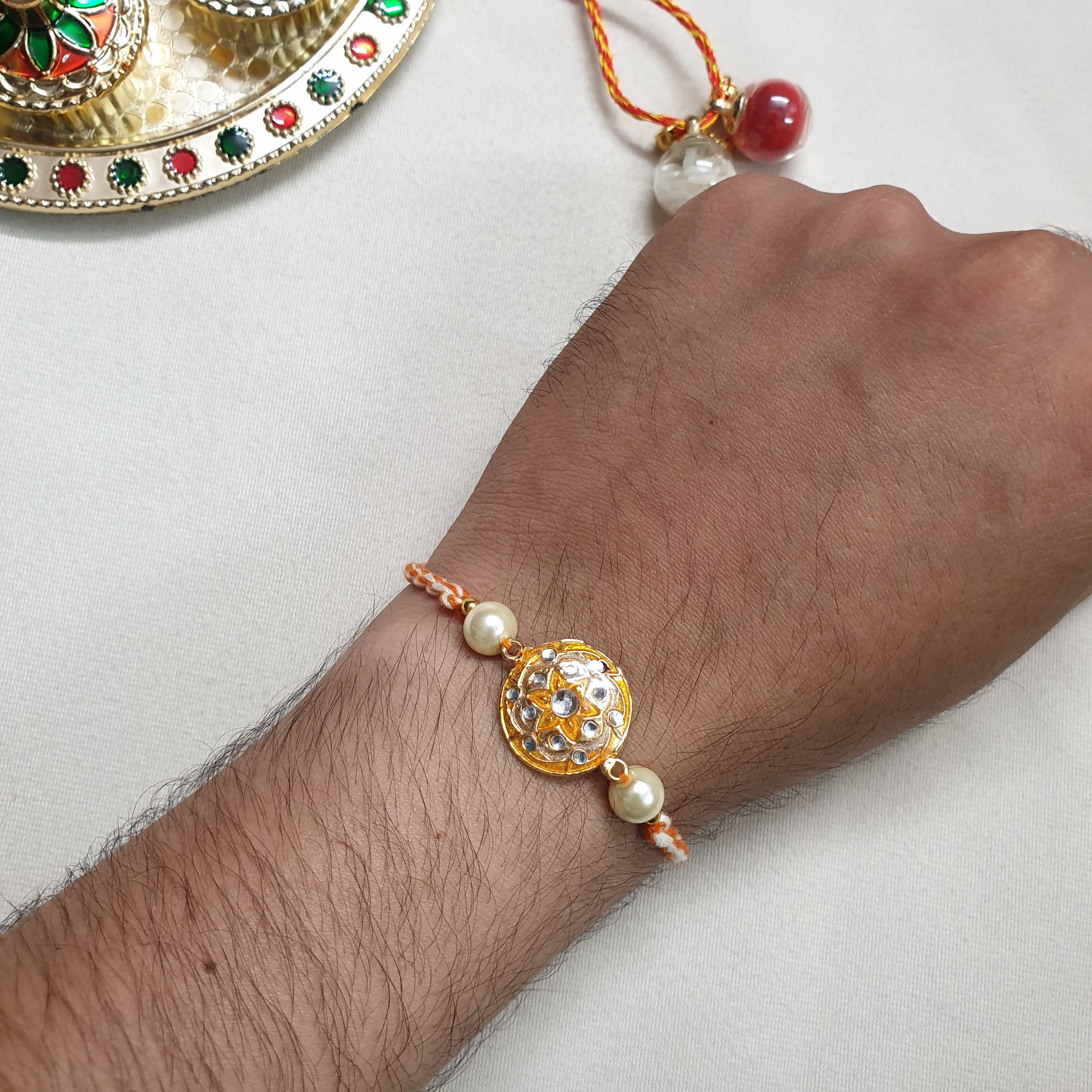 Orange Enamel Floral Kundan Rakhi