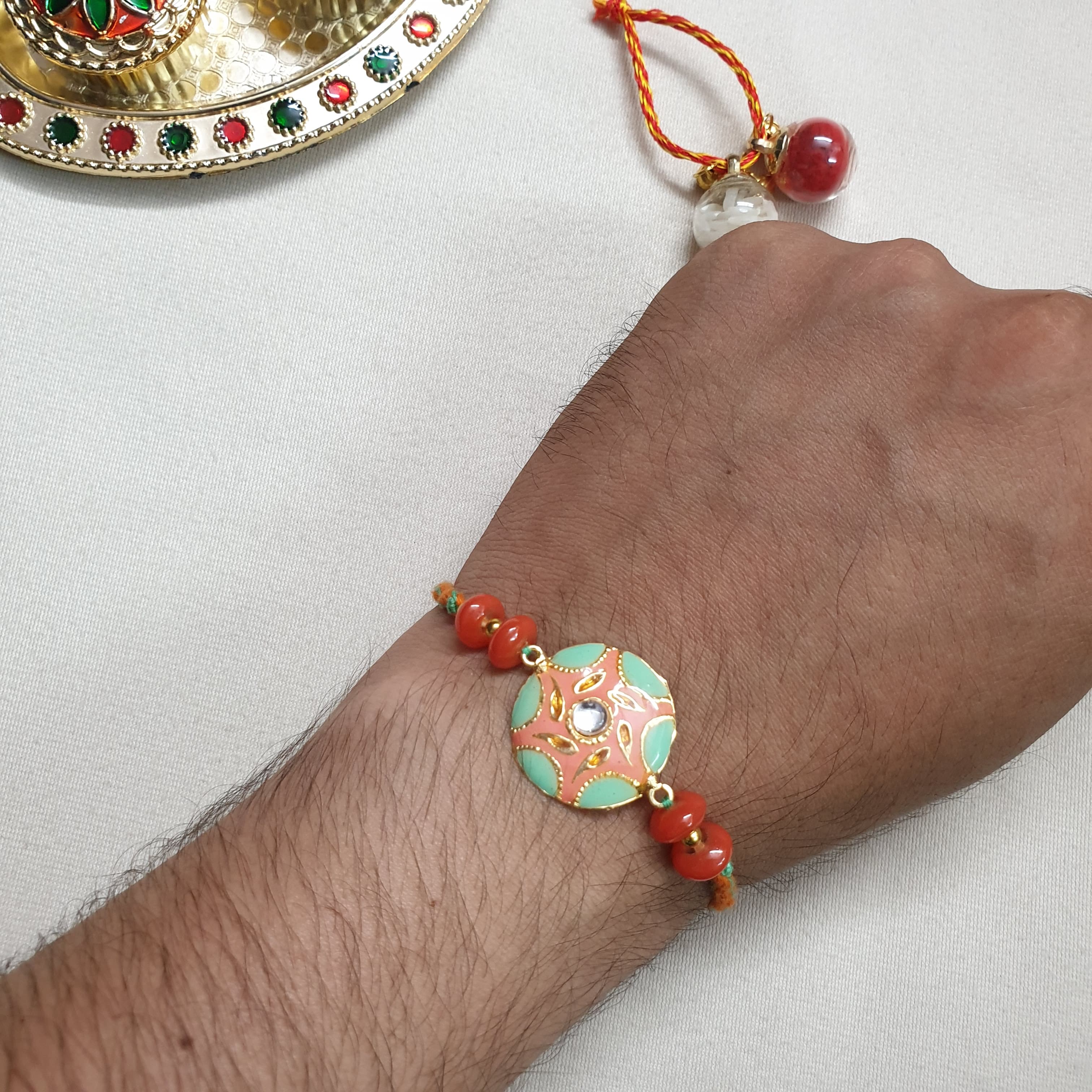 Peach Enamel Floral Kundan Rakhi