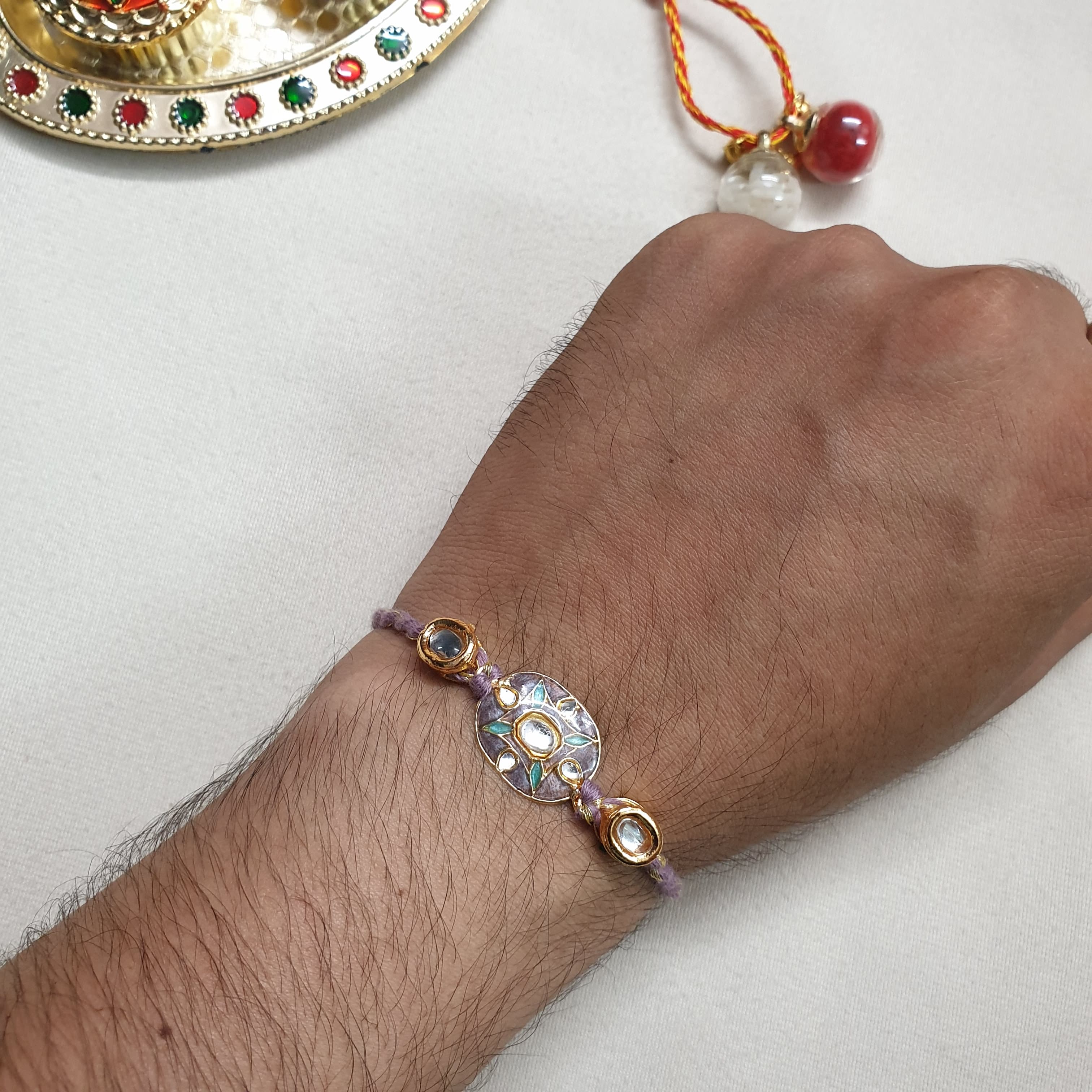 Mauve Enamel Floral Kundan Rakhi