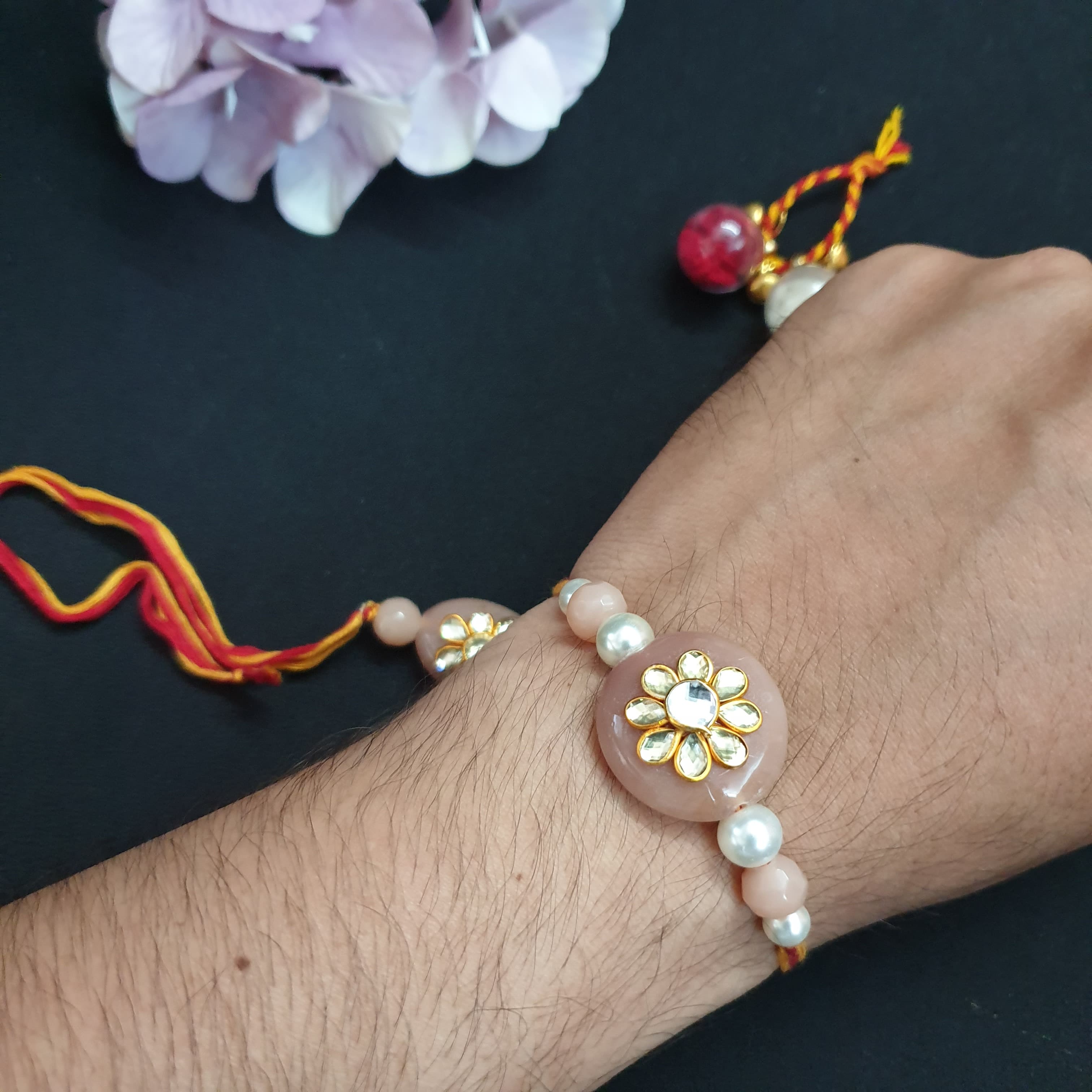 Peach Kundan Paachi Rakhi Lumba Set
