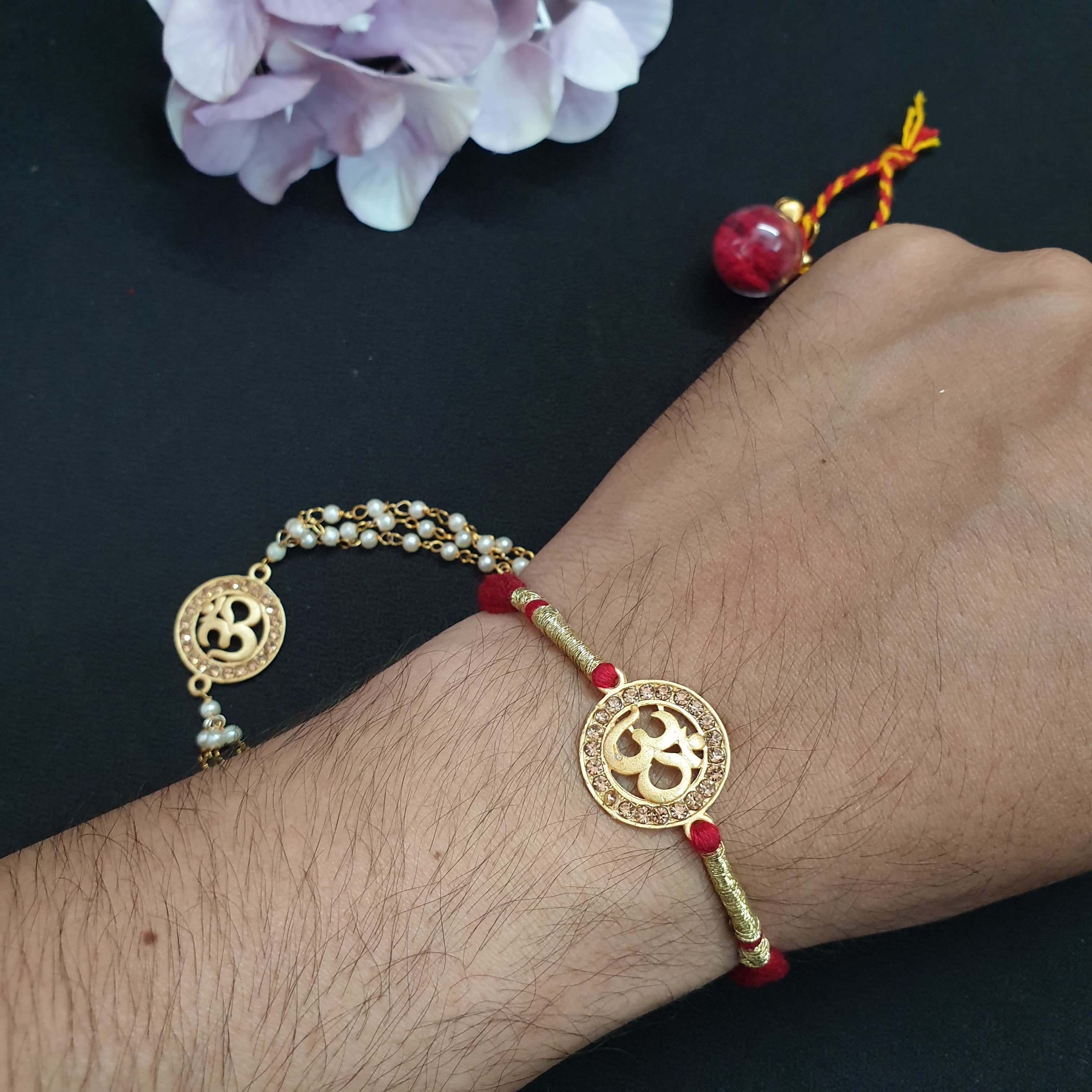 Red Om Couple Rakhi Set