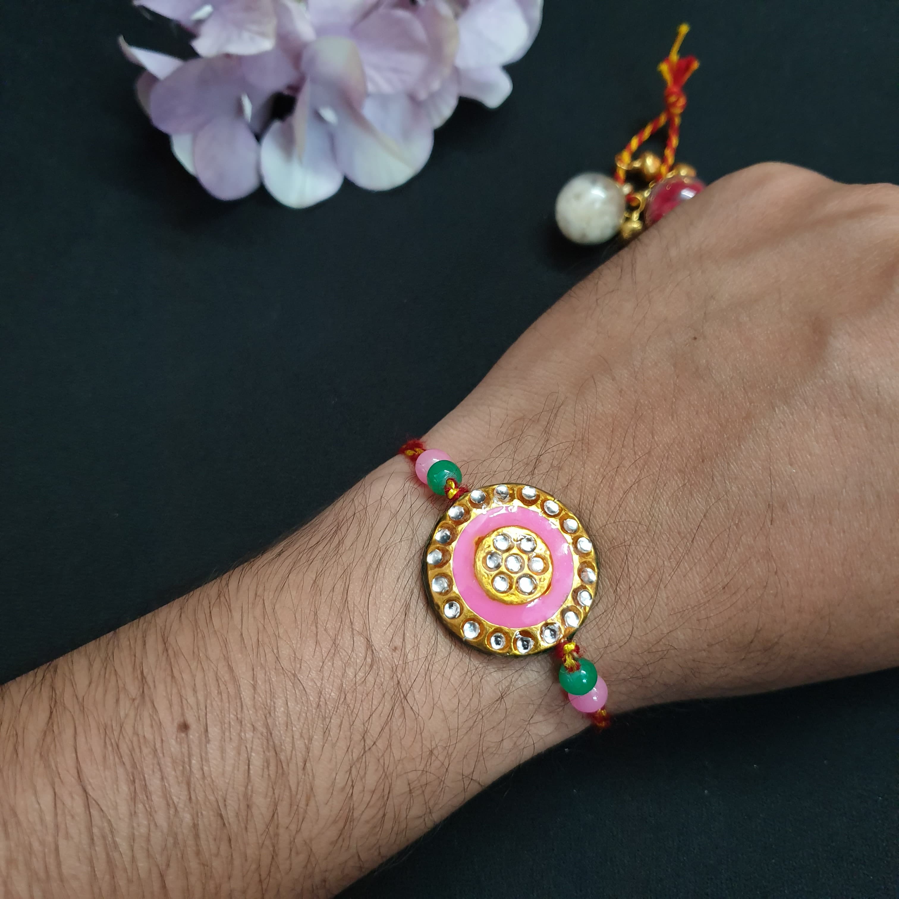 Pink Meenakari Stone Round Rakhi (Pack of One)