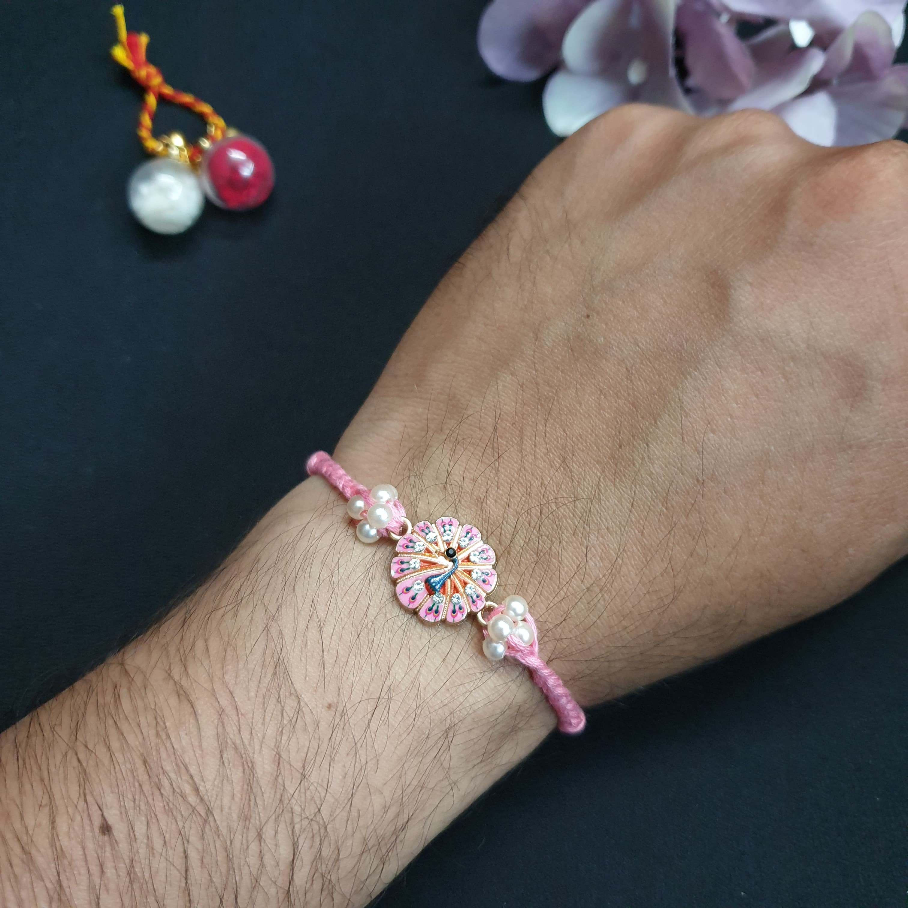 Pink Meenakari Peacock Pearl Rakhi For Rakshabandhan