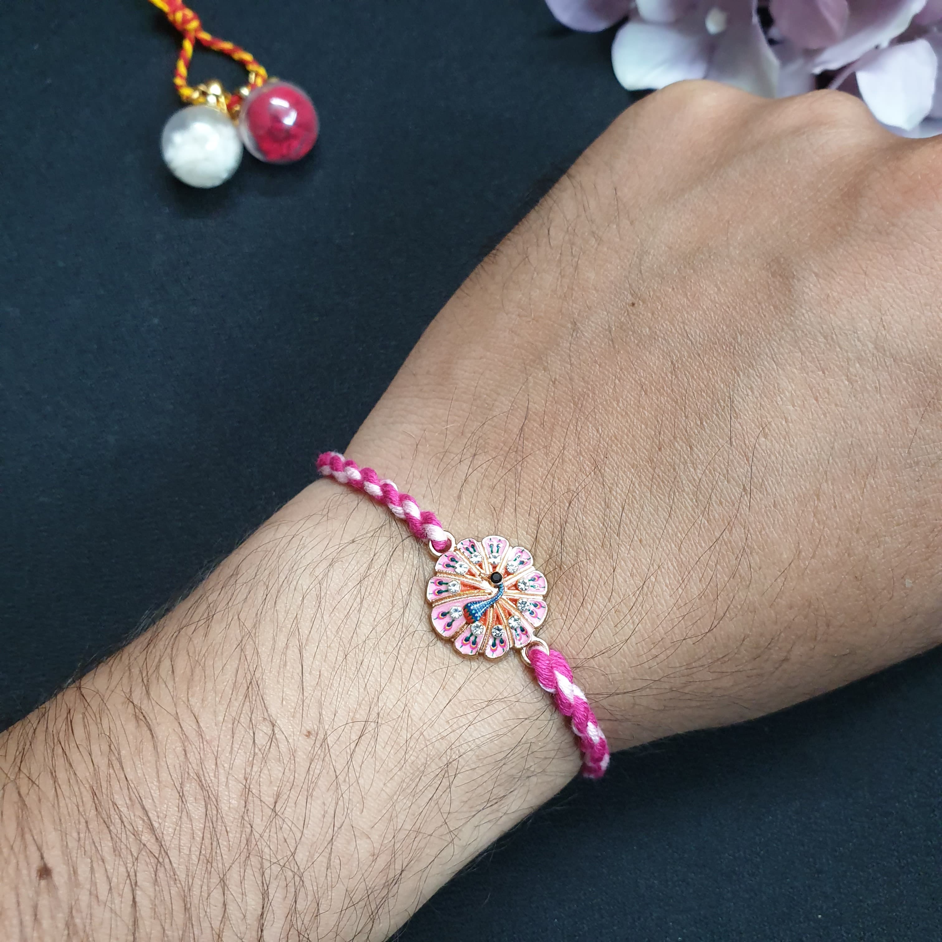 Pink Meenakari Peacock Rakhi