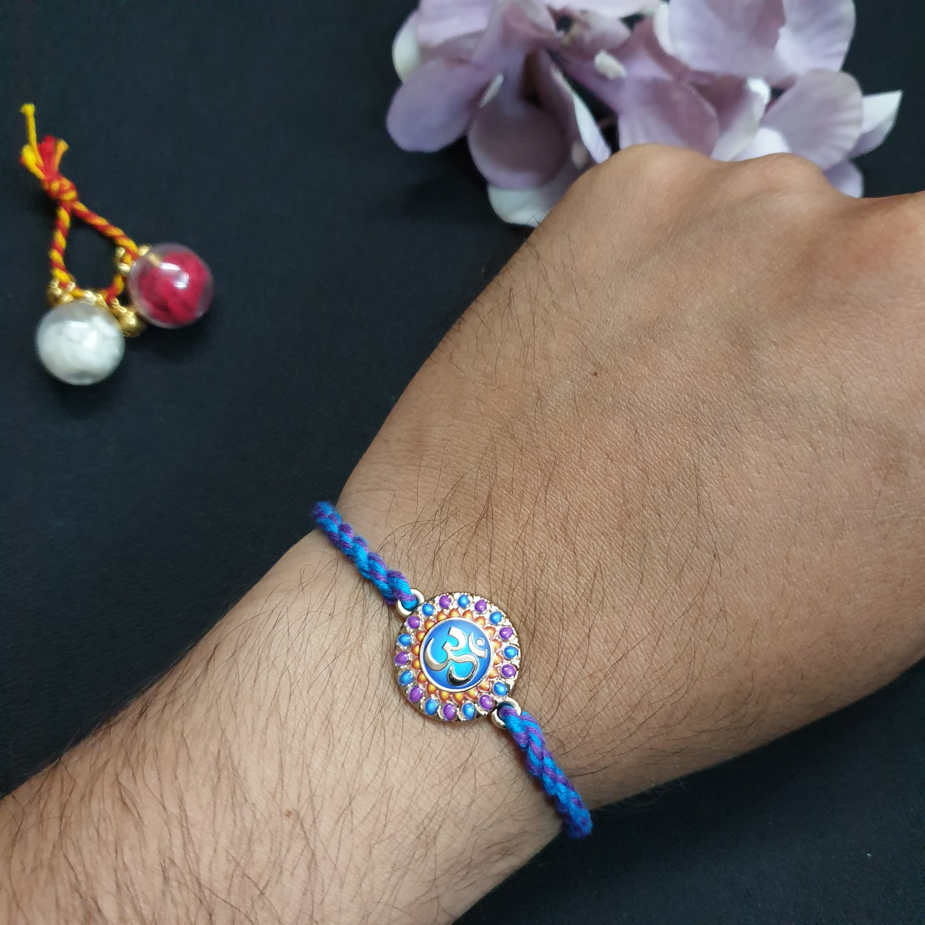 Purple Om Braided Rakhi For Rakshabandhan