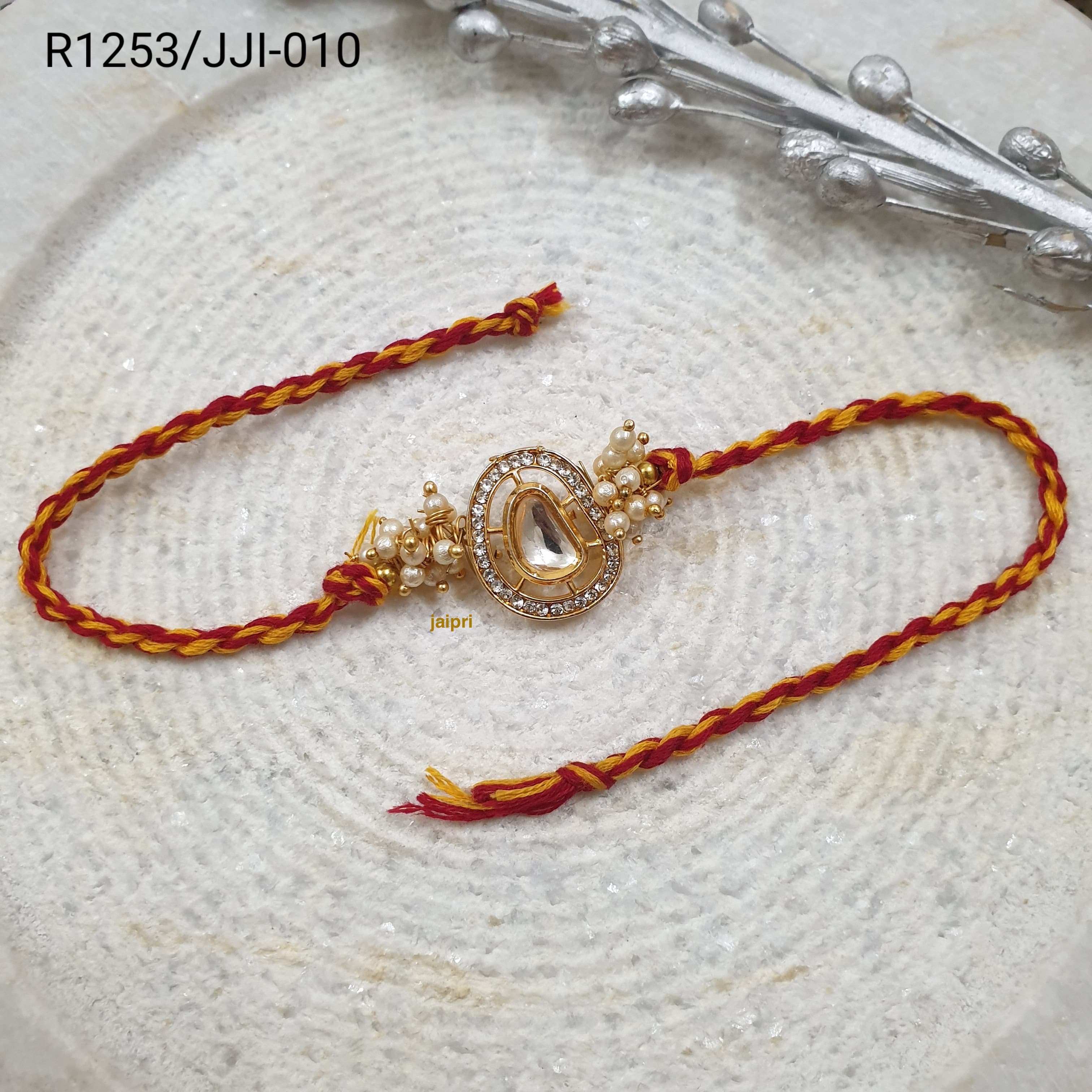 Gold Tone Kundan Pearl Rakhi