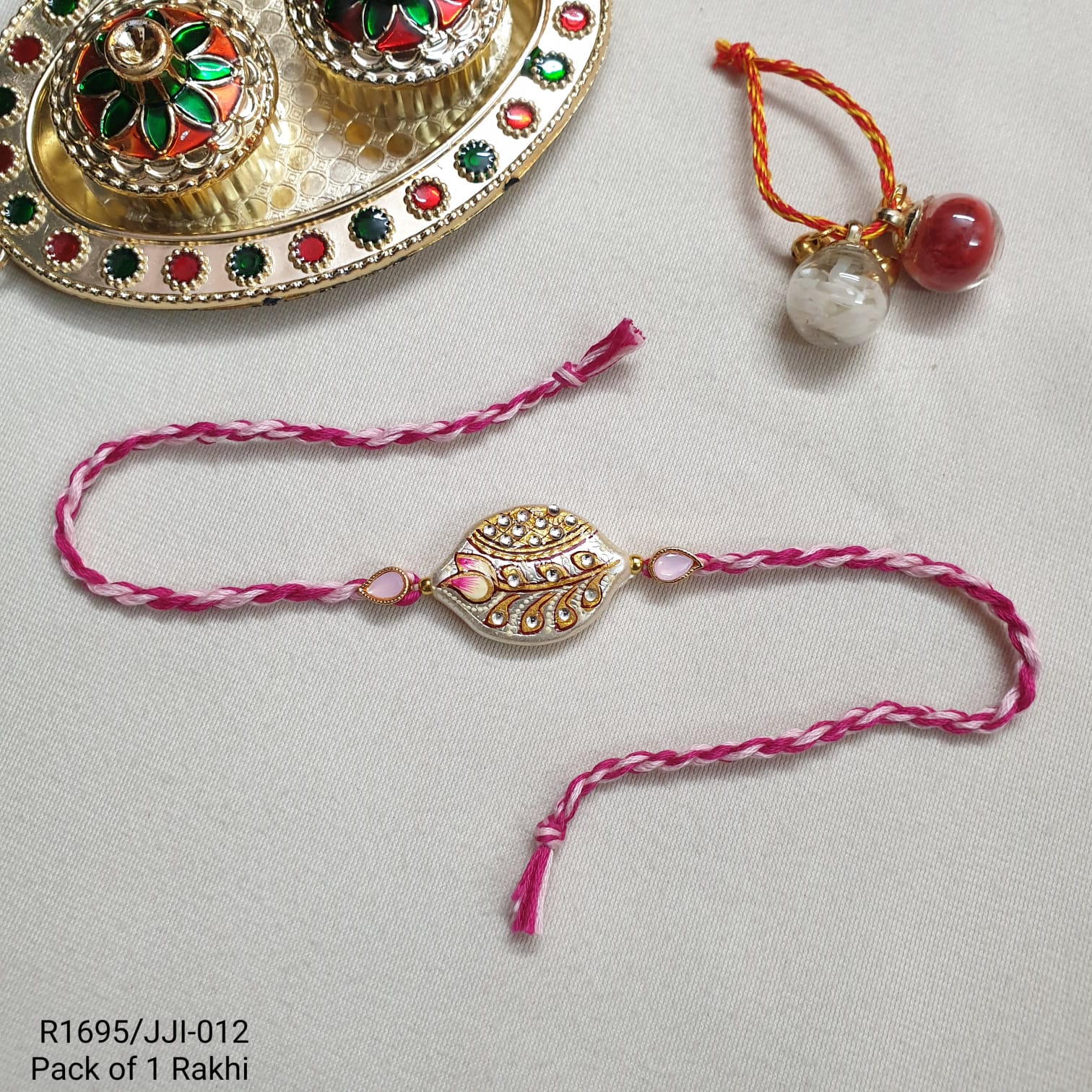 Handpainted Pink Stone Rakhi