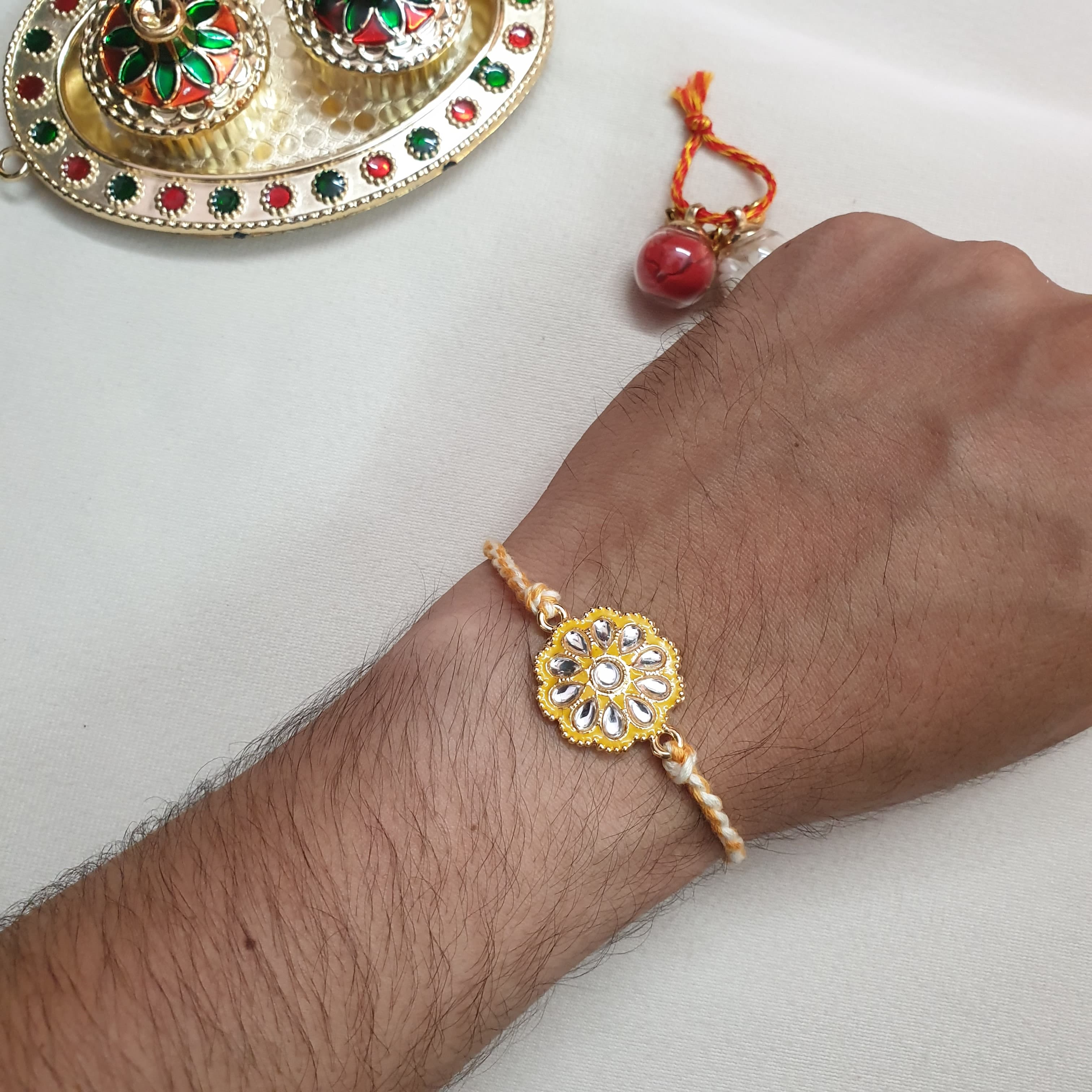 Yellow Kundan Meenakari Floral Rakhi