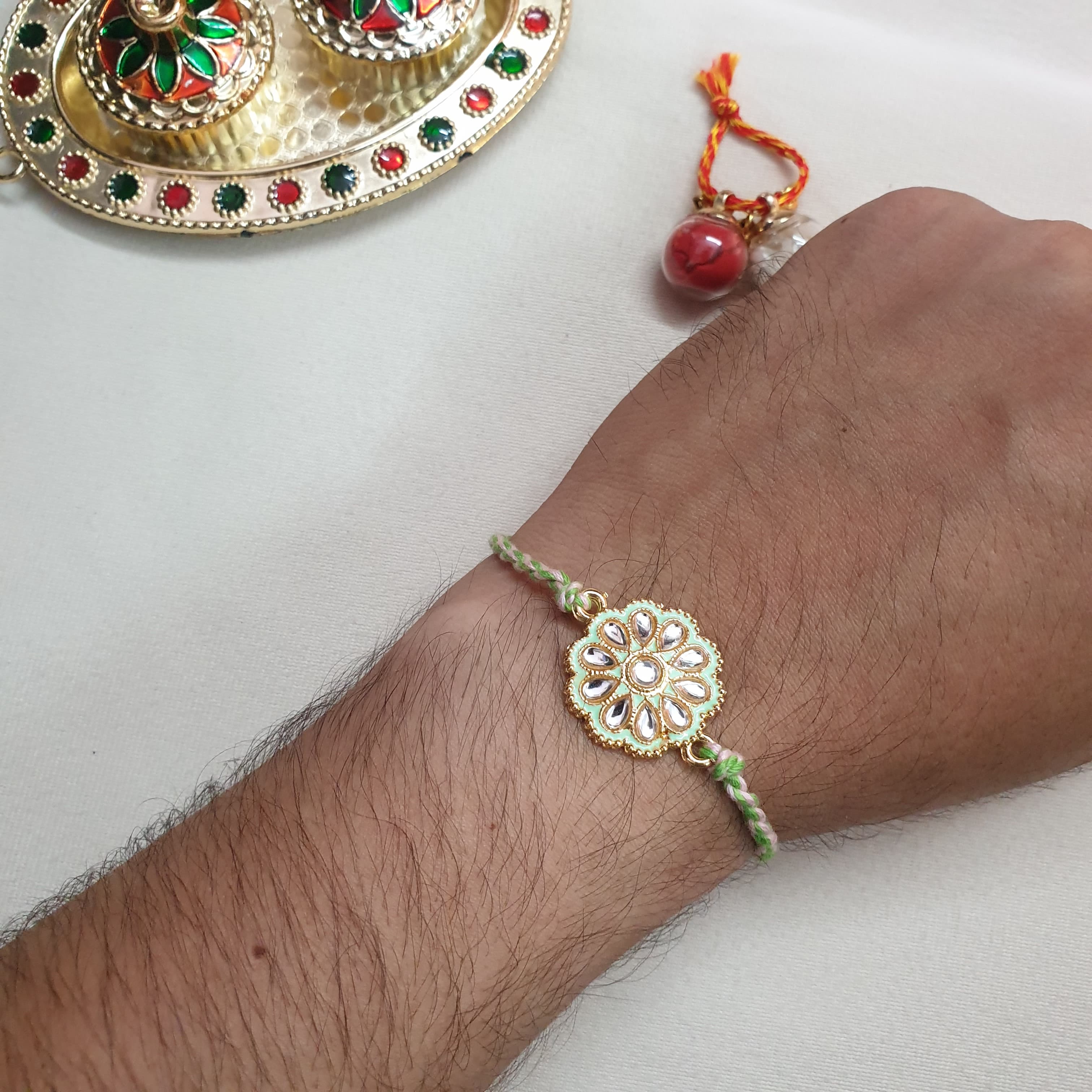 Mint Green Kundan Meenakari Floral Rakhi