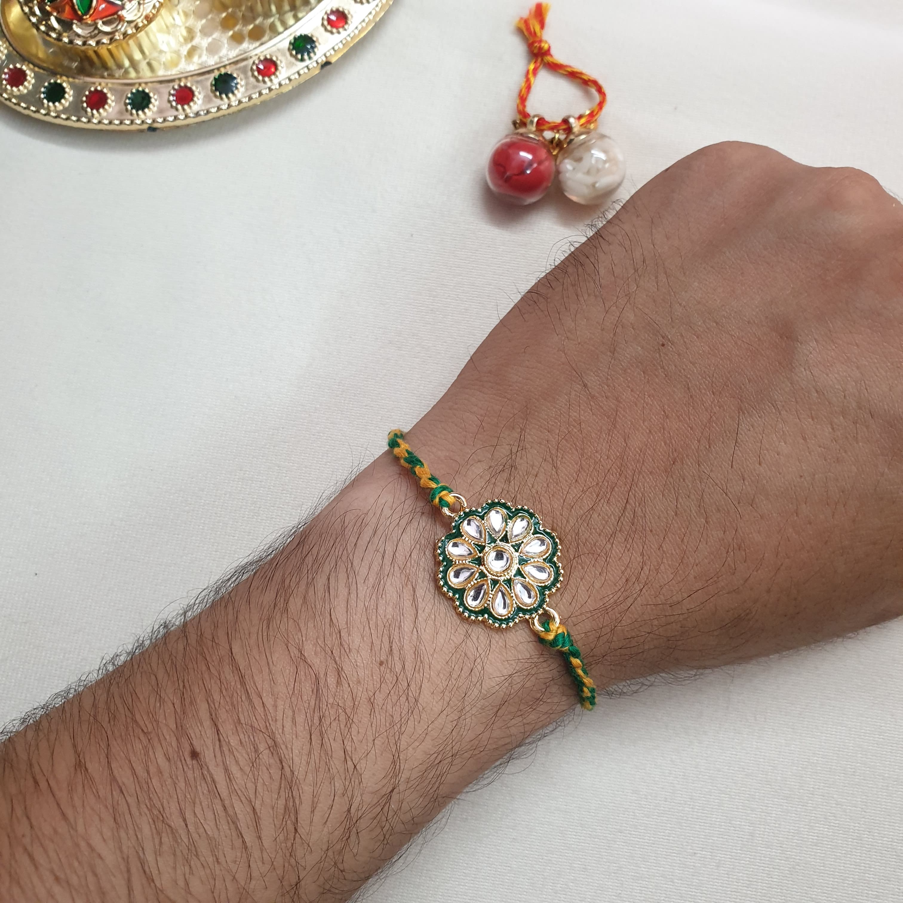 Green Kundan Meenakari Floral Rakhi