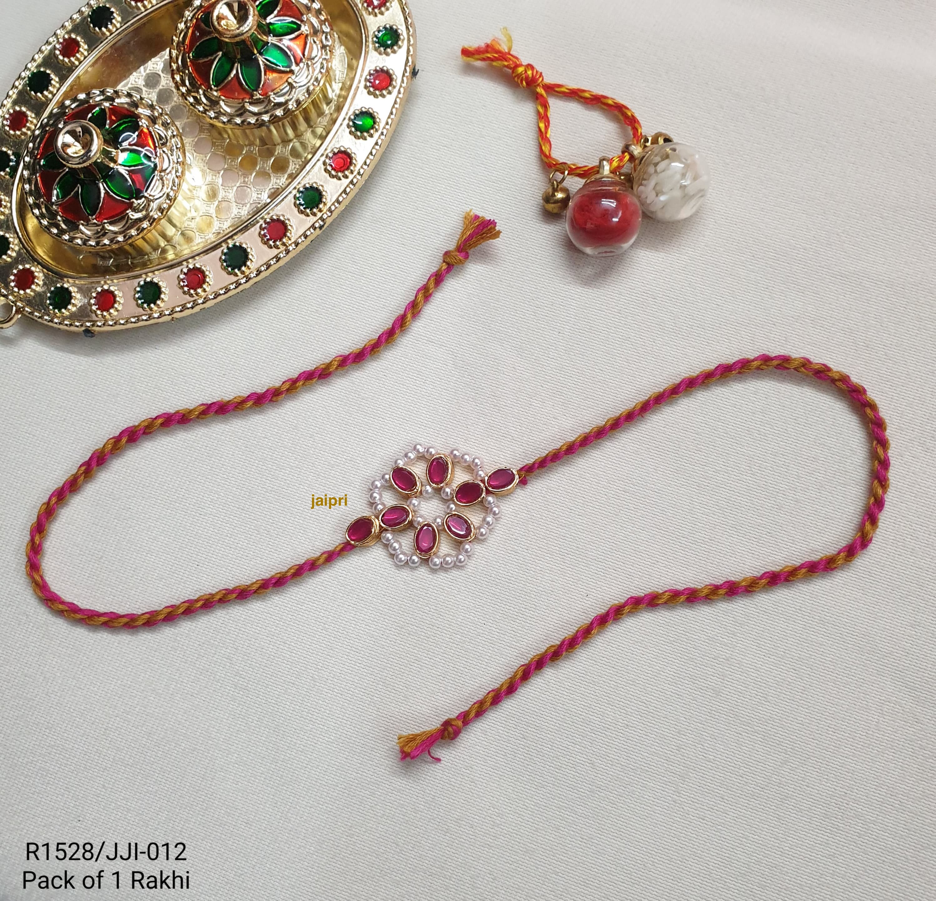 Pink Floral Pearl Rakhi For Brother