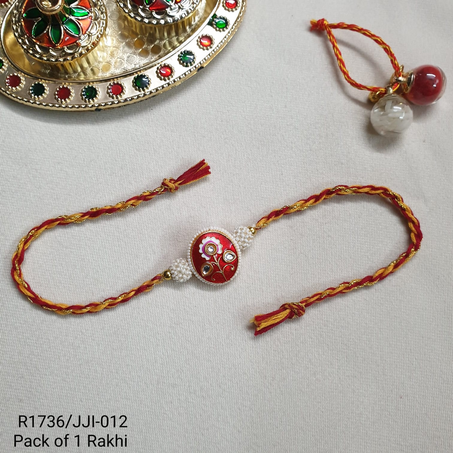Red Meenakari Seed Bead Rakhi For Brother