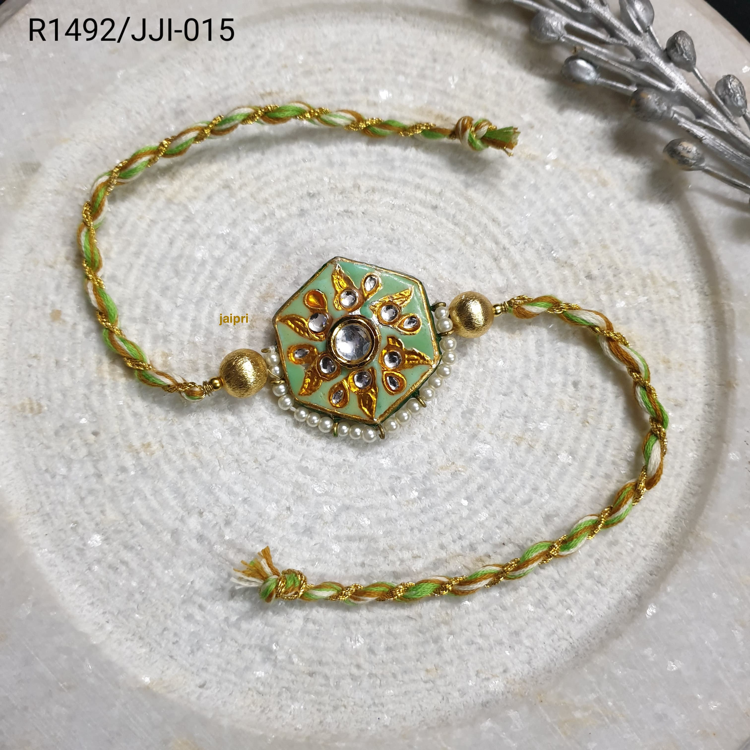 Mint Green Kundan Meena Rakhi For Brother