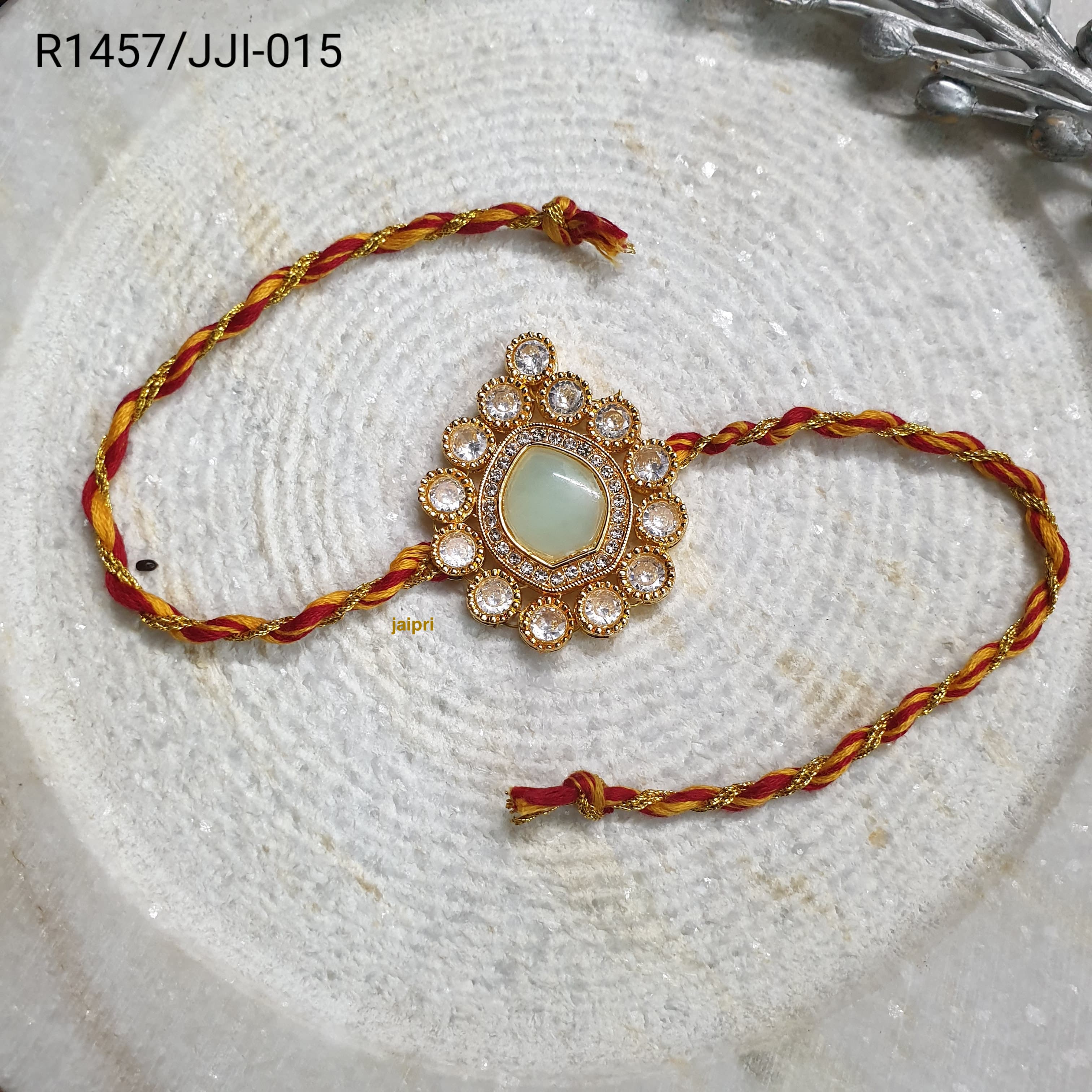 Mint Green Kundan Stone Rakhi For Brother