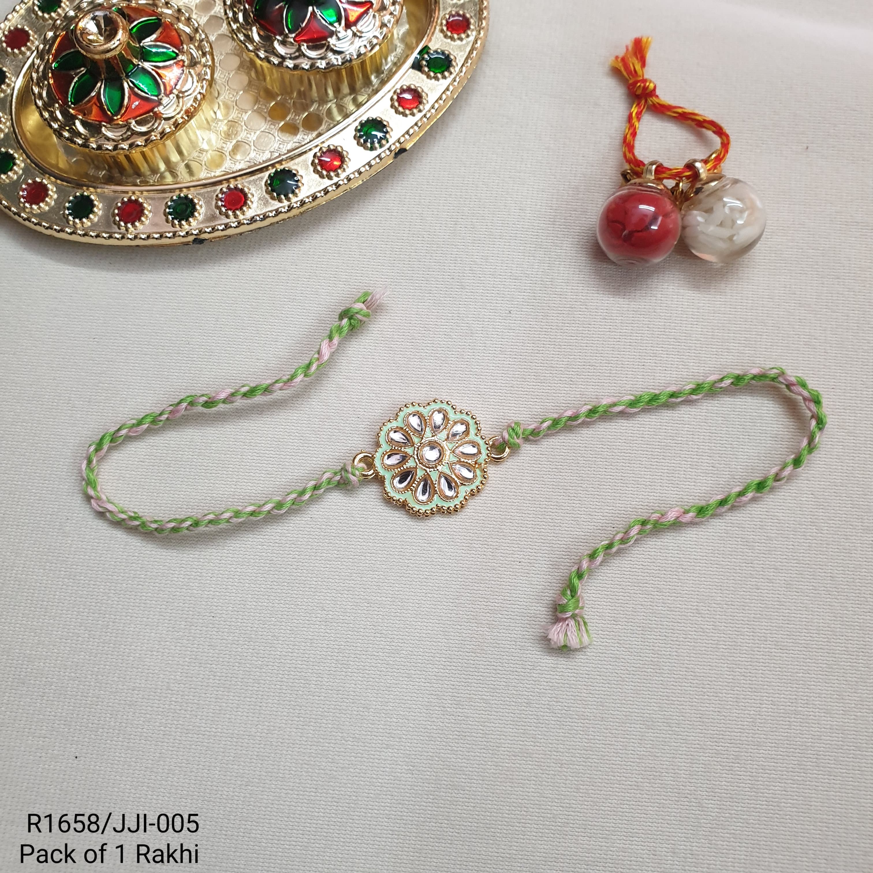 Mint Green Kundan Meenakari Floral Rakhi