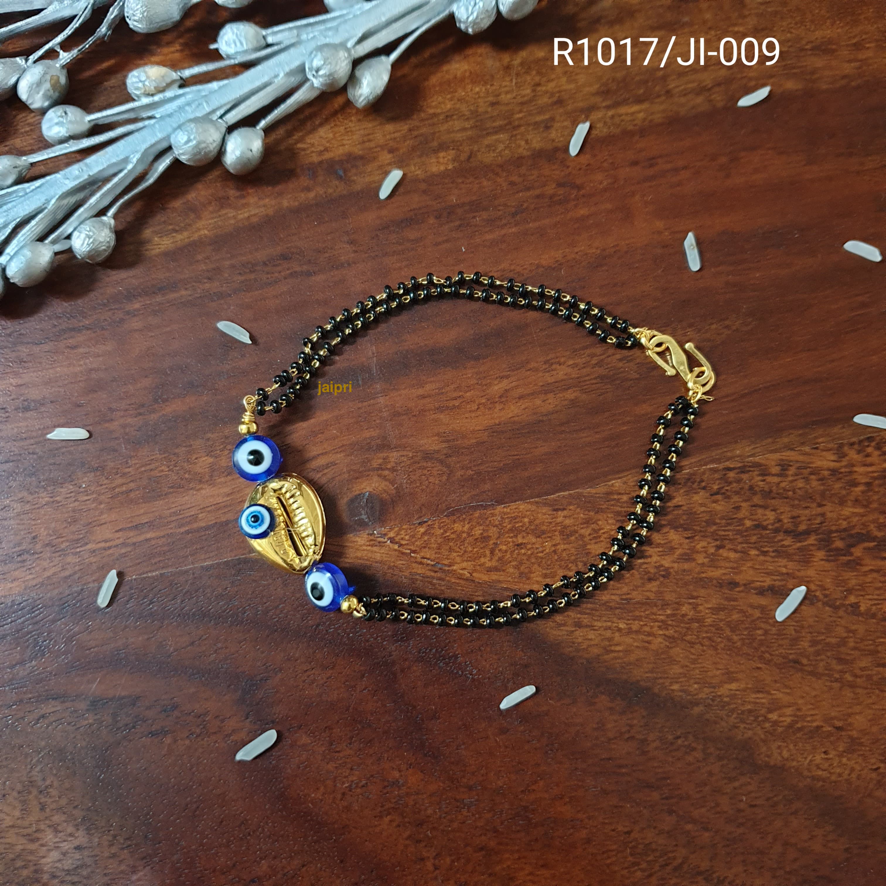 Cowrie Evil Eye Rakhi Bracelet