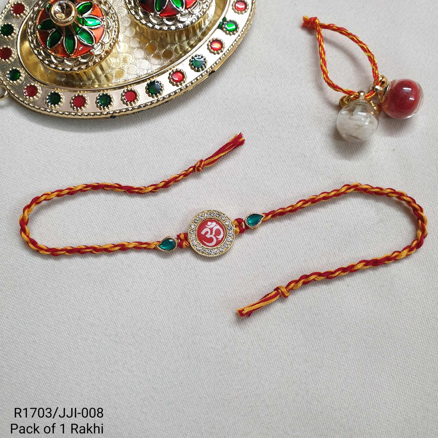 Om Green Stone Bead Rakhi For Brother