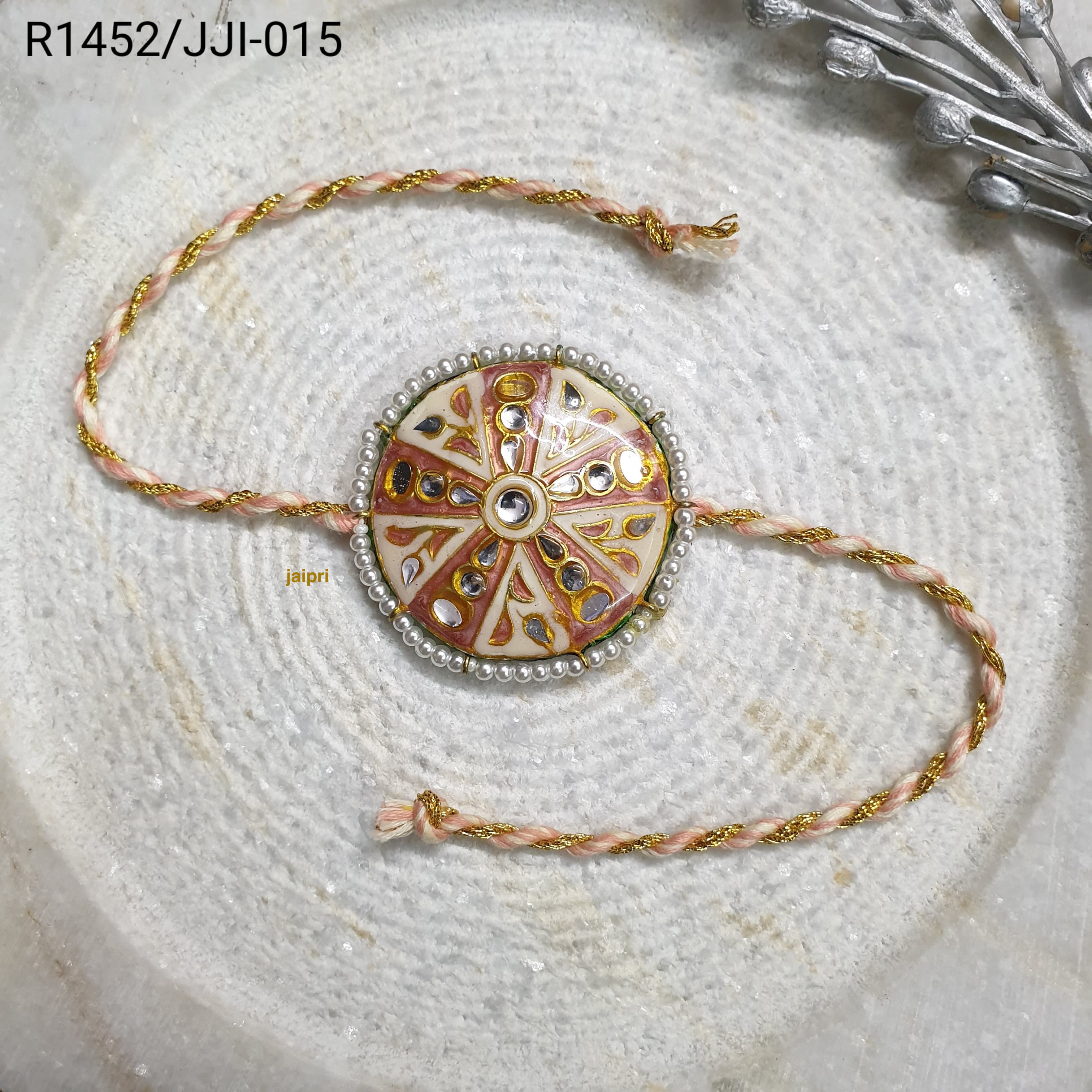 Peach Round Kundan Meena Rakhi