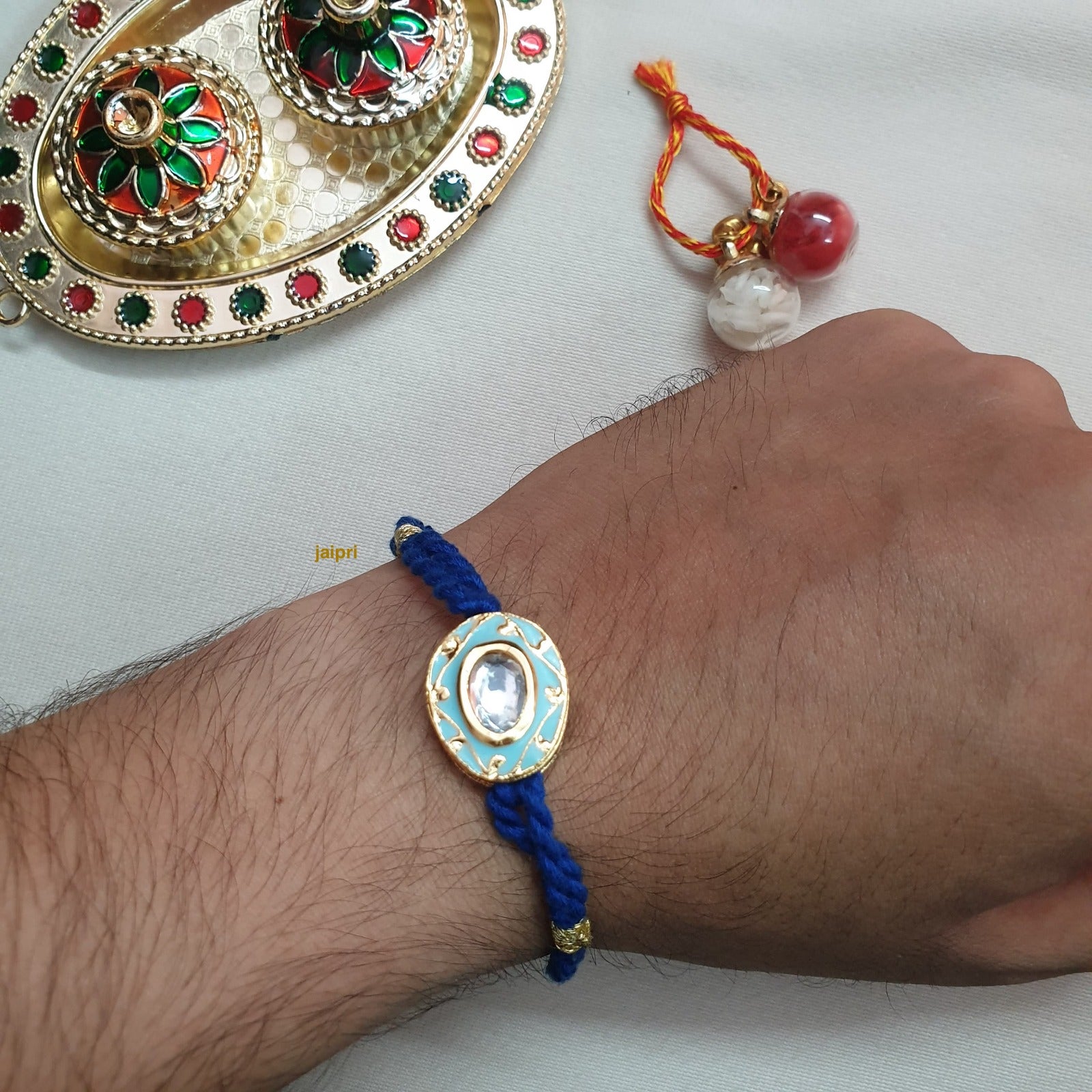 Turquoise Meenakari Rakhi