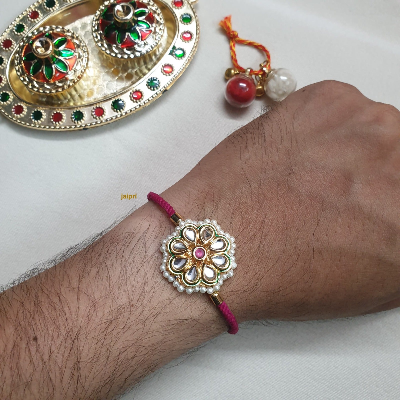 Kundan Stone Floral Rakhi Bracelet