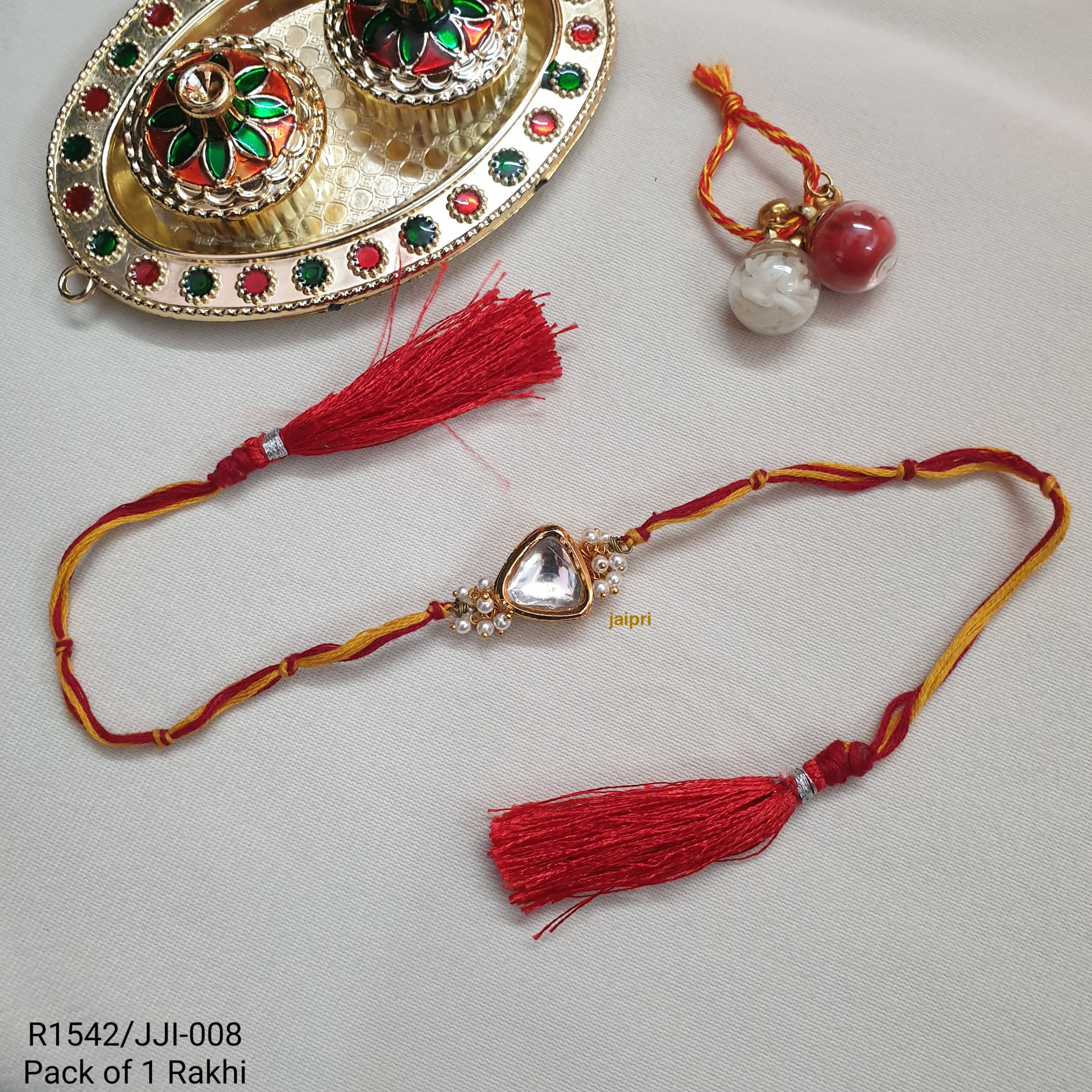 Gold Tone Triangle Kundan Rakhi