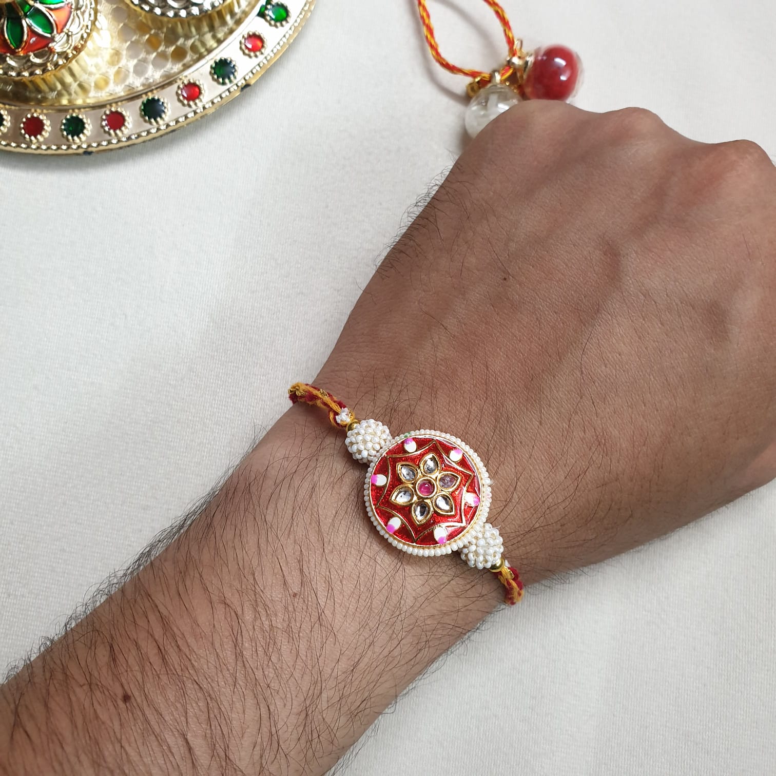 Red Meenakari Floral Seed Bead Rakhi For Brother (Pack Of One)