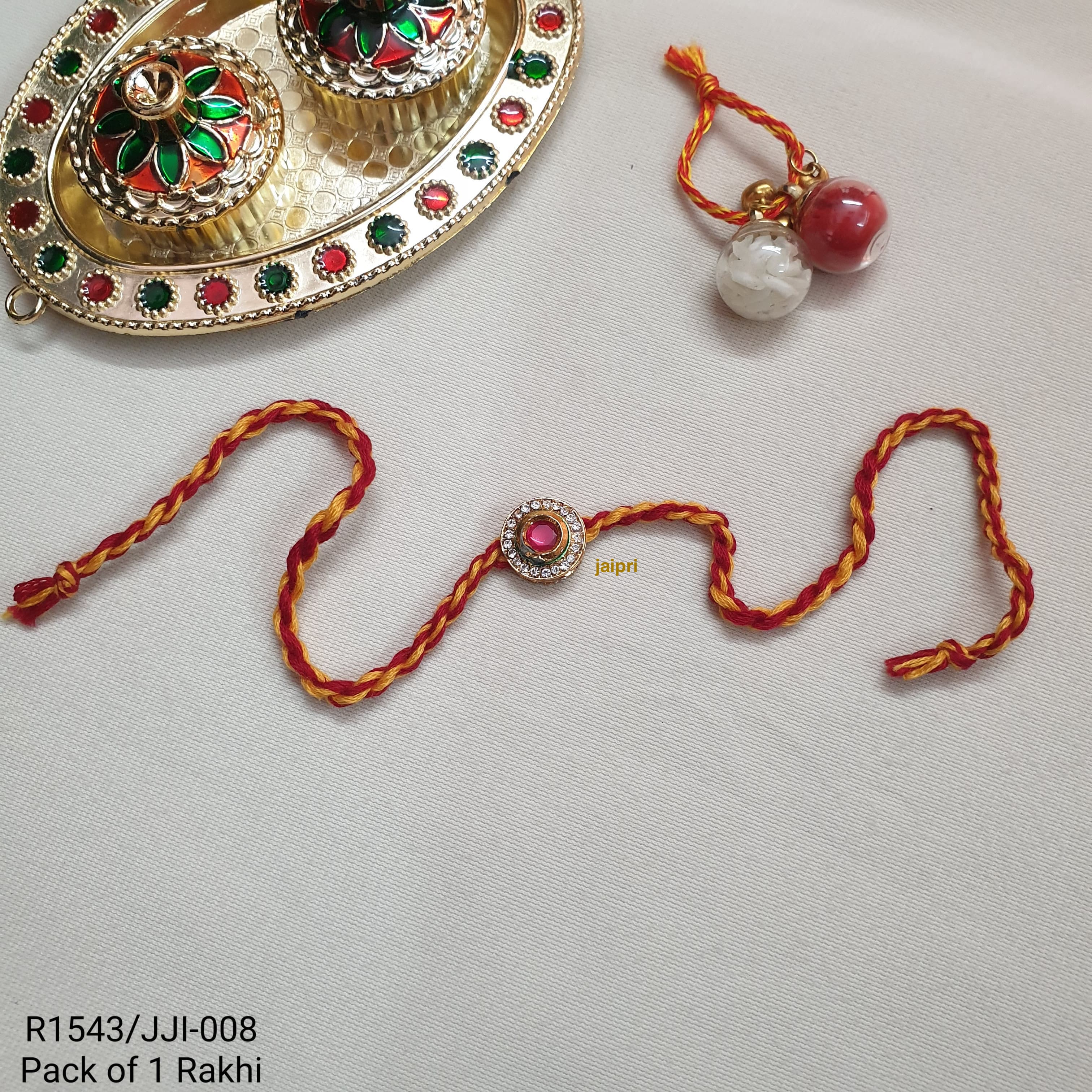 Gold Tone Red Stone Round Rakhi