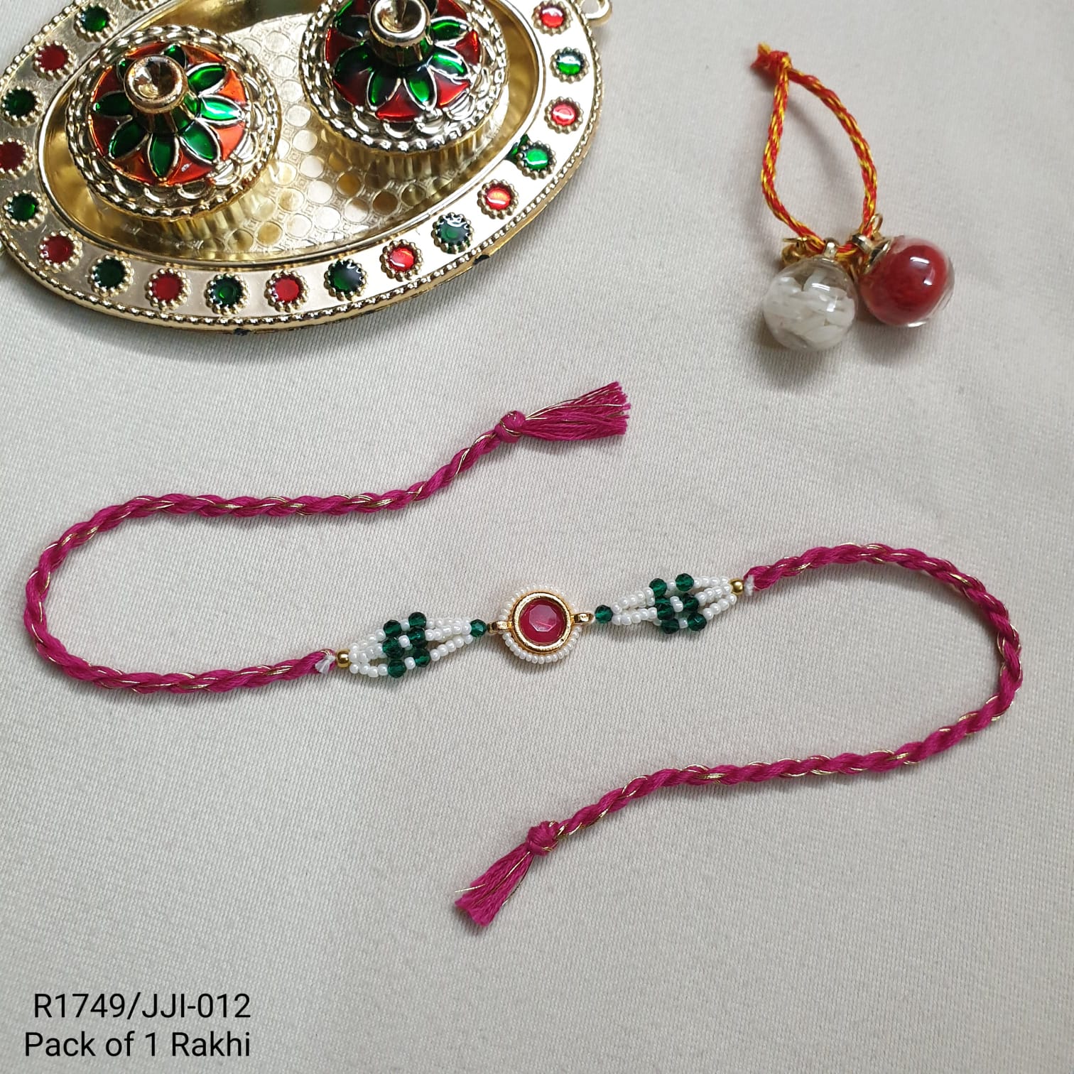 Pink Stone Green Seed Bead Rakhi
