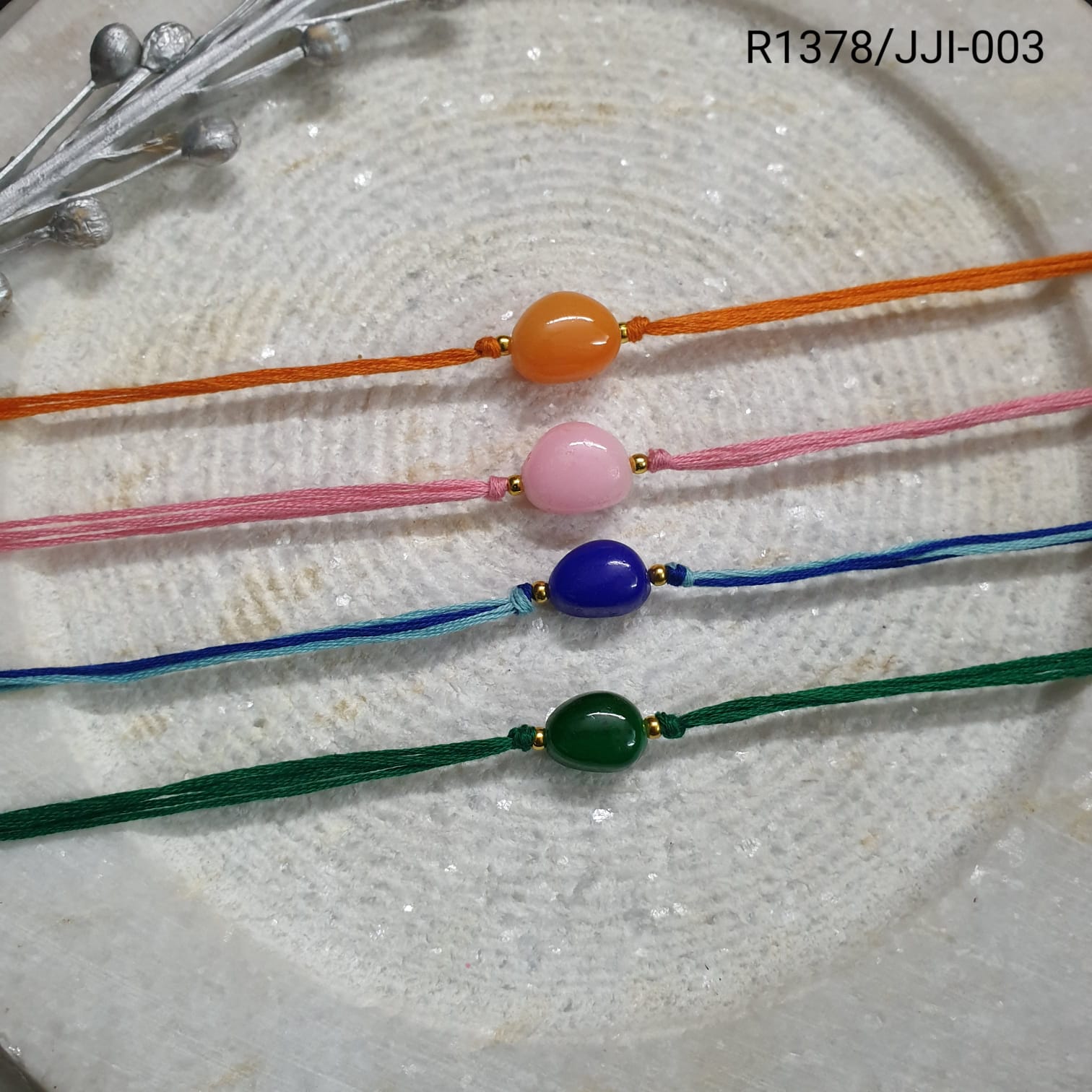 Dainty Stone Rakhi (Pack of Four)