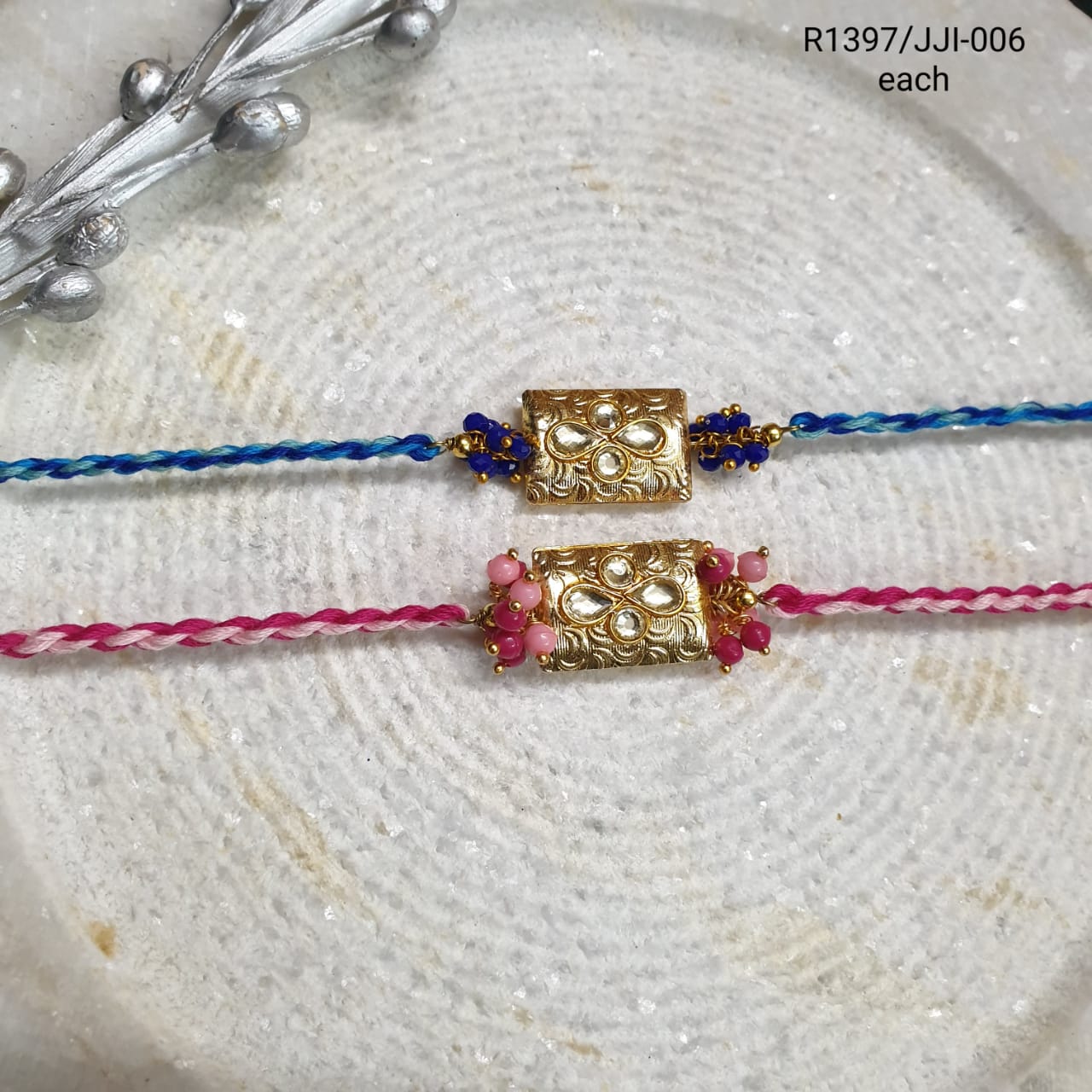 Gold Tone Kundan Rakhi For Brother Bhabhi (Pack Of Two)