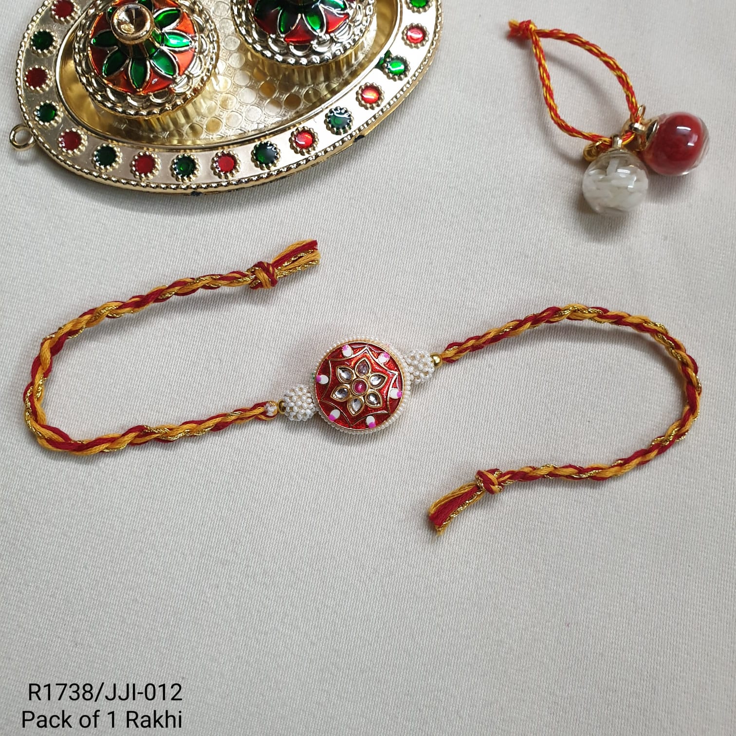 Red Meenakari Floral Seed Bead Rakhi For Brother (Pack Of One)