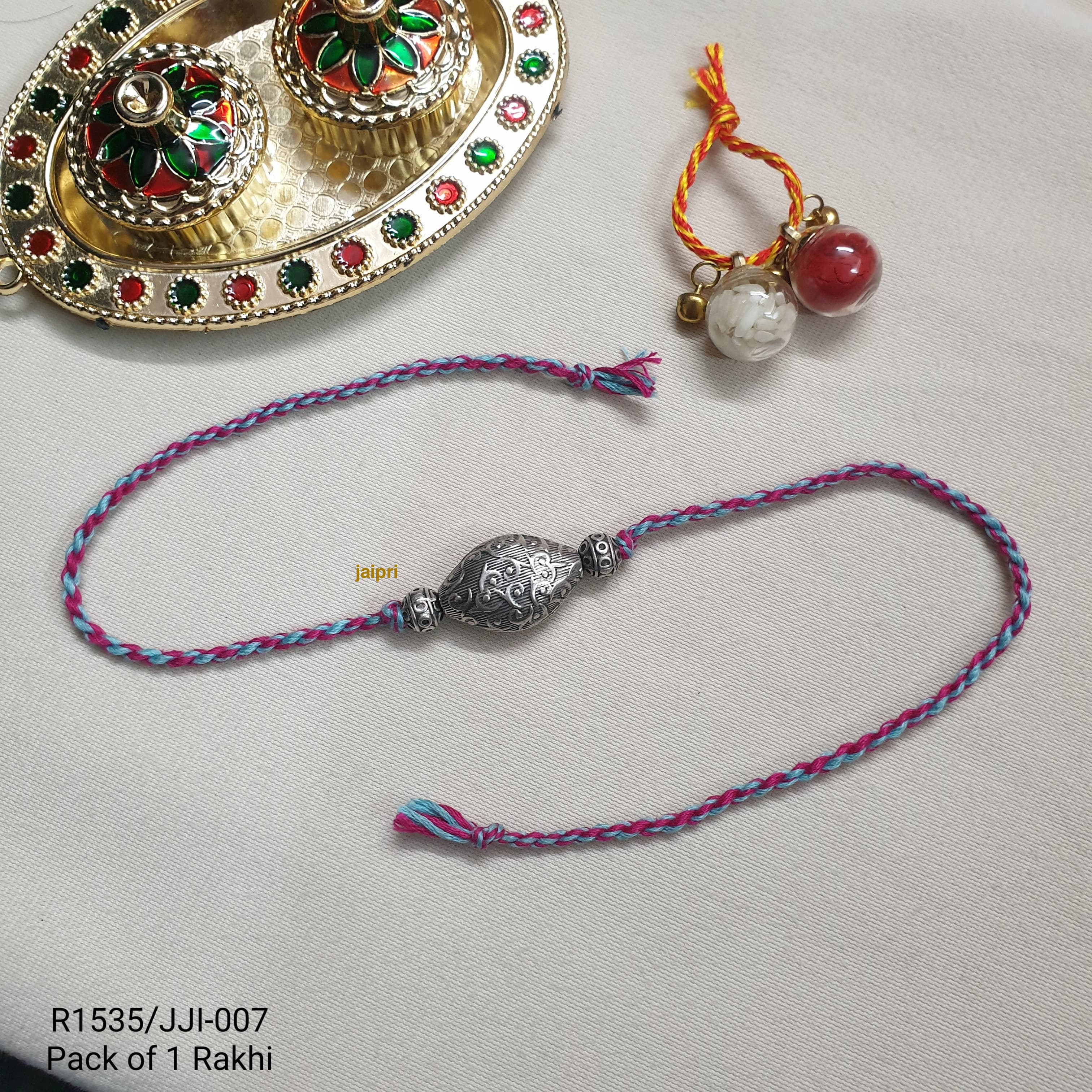 Silver LookaLike Oval Beads Rakhi