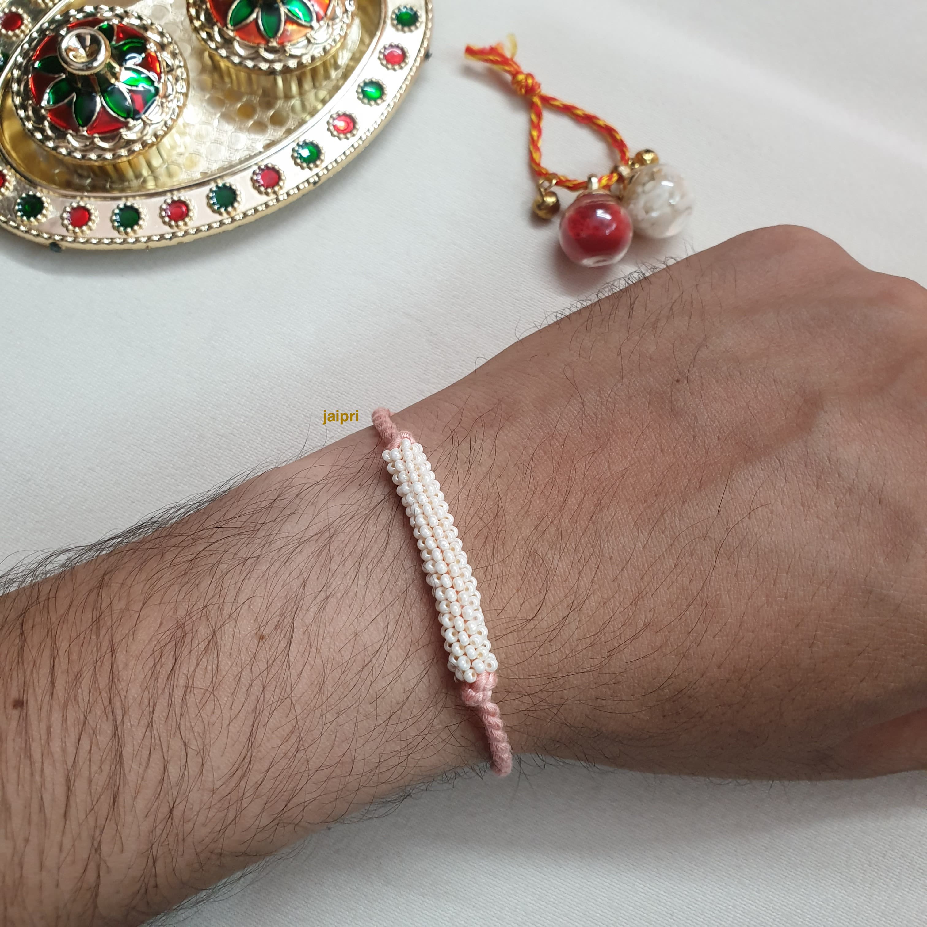 Seed Beads Baby Pink Thread Rakhi