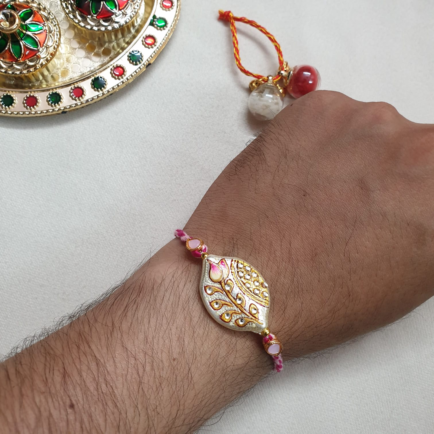 Handpainted Pink Stone Rakhi