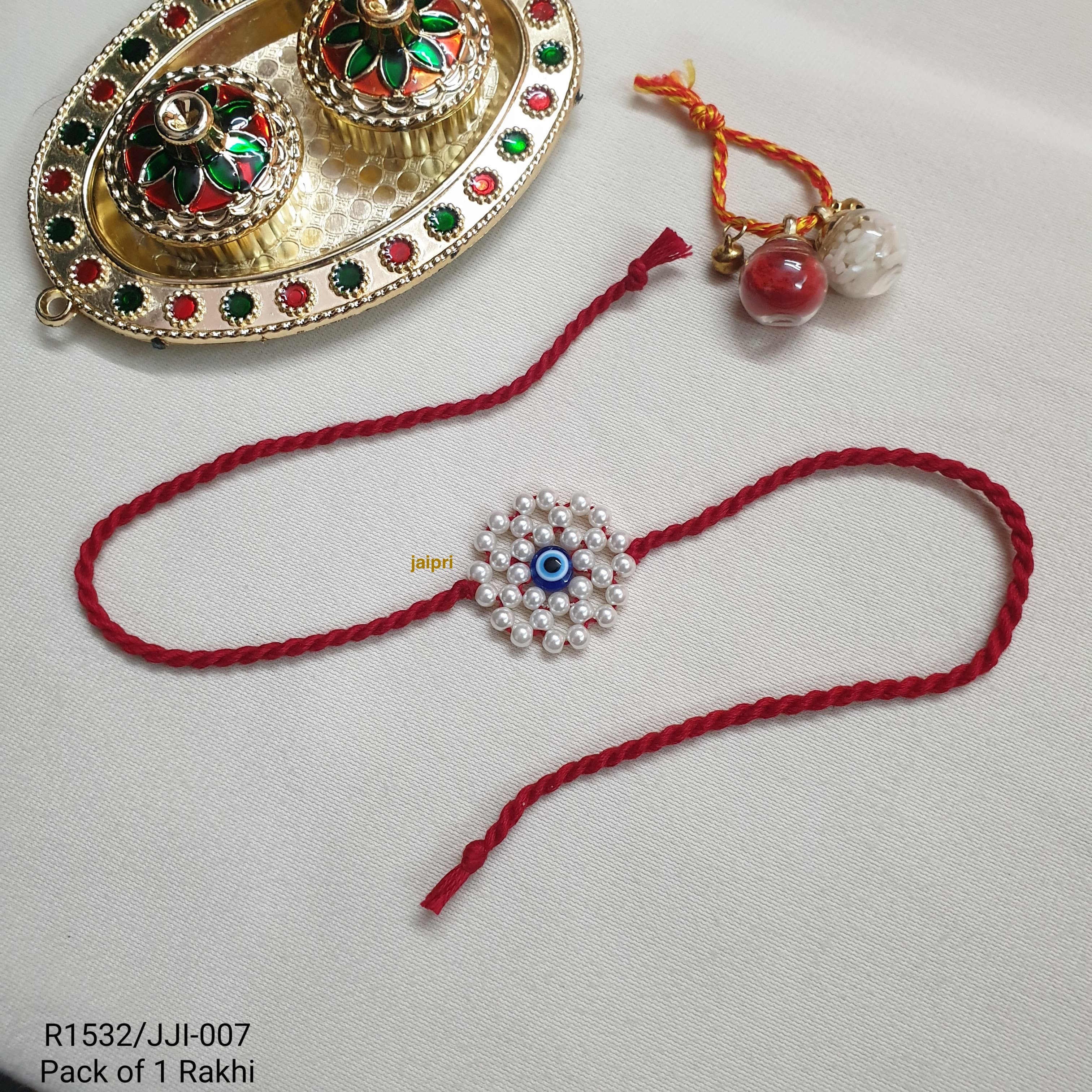 Pearl Floral Evil Eye Rakhi