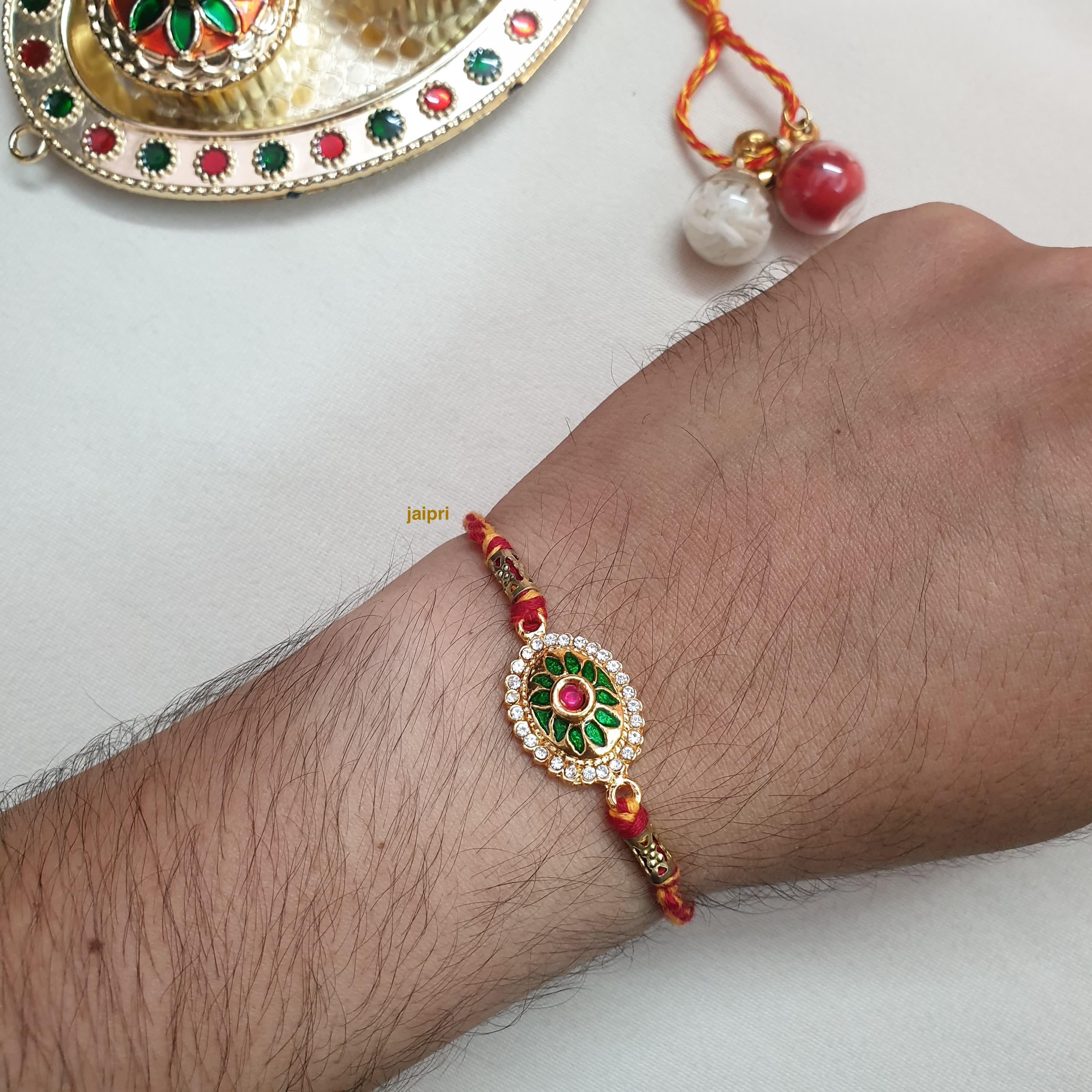 Gold Tone Green Oval Meenakari Rakhi