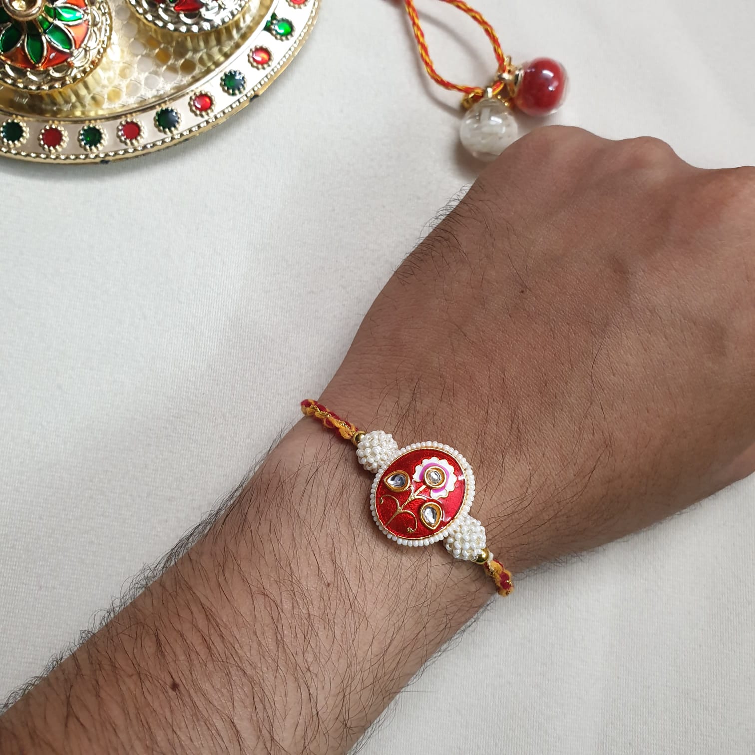 Red Meenakari Seed Bead Rakhi For Brother
