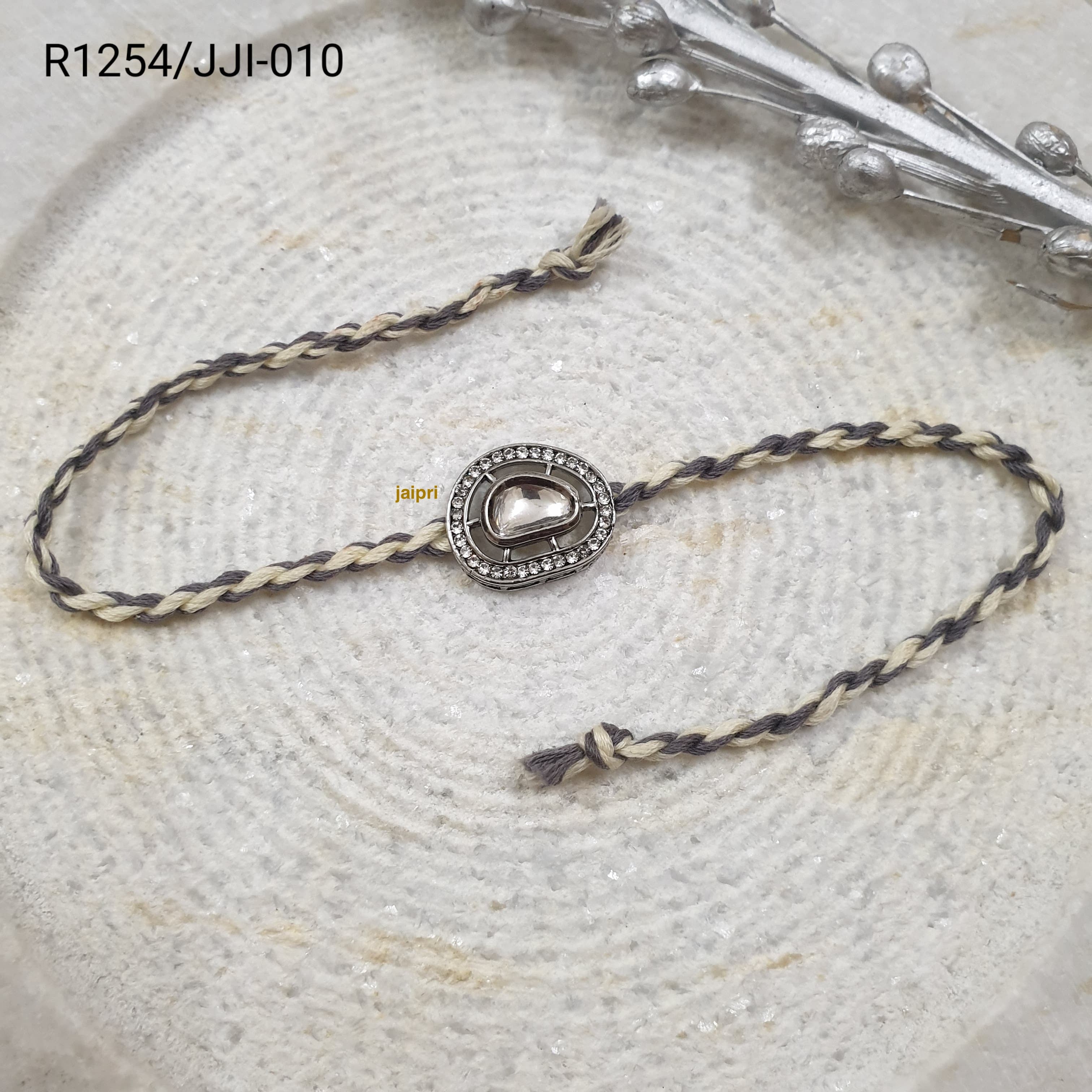 Silver Tone Kundan Rakhi