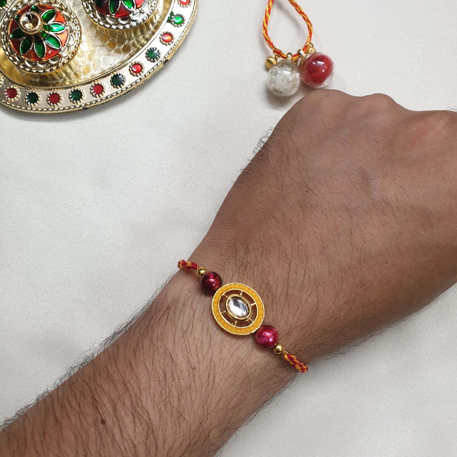Kundan Yellow Magenta Bead Rakhi