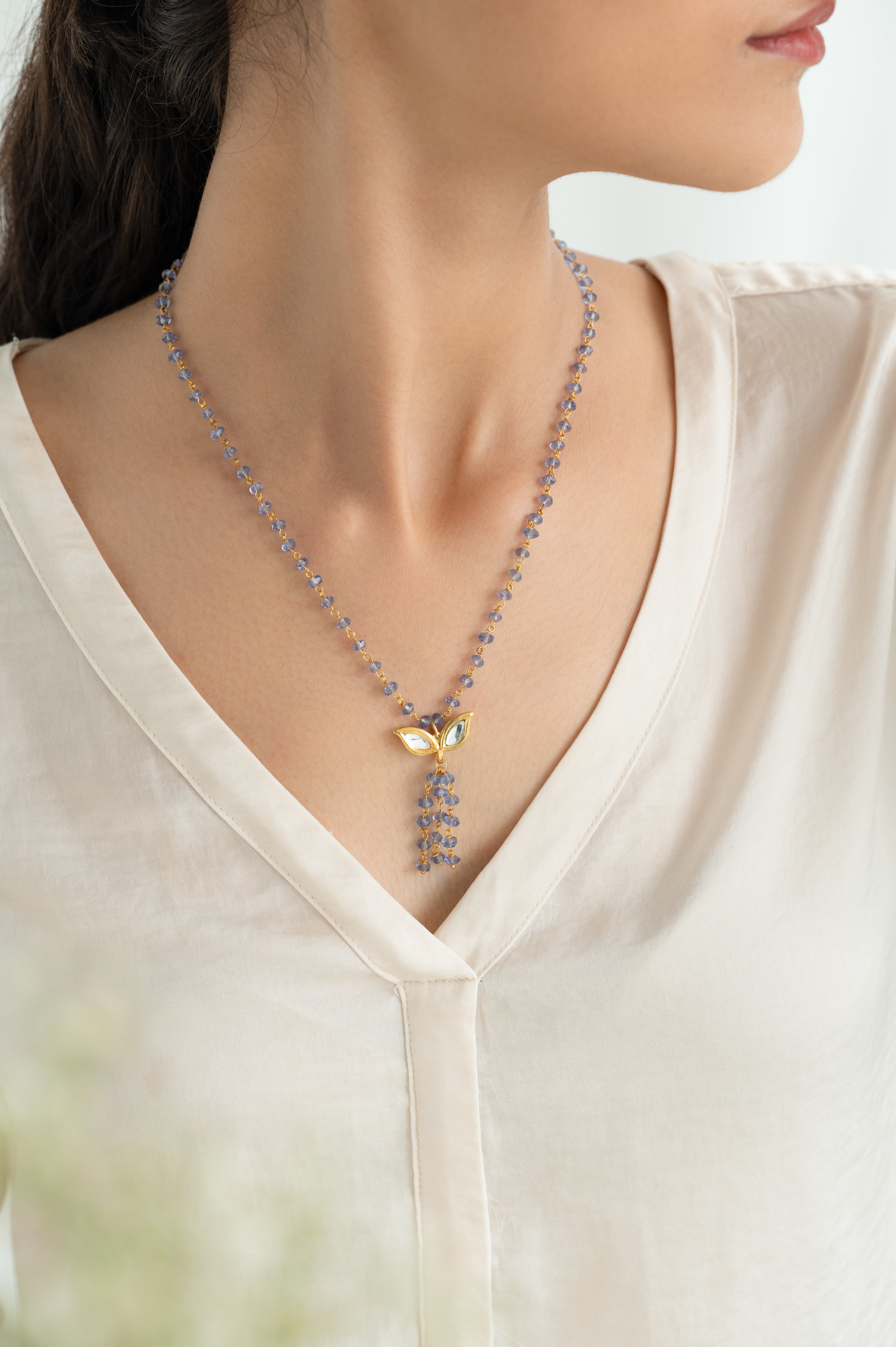 Elegant Blue Beaded Necklace with Gold Leaf Kundan Pendant